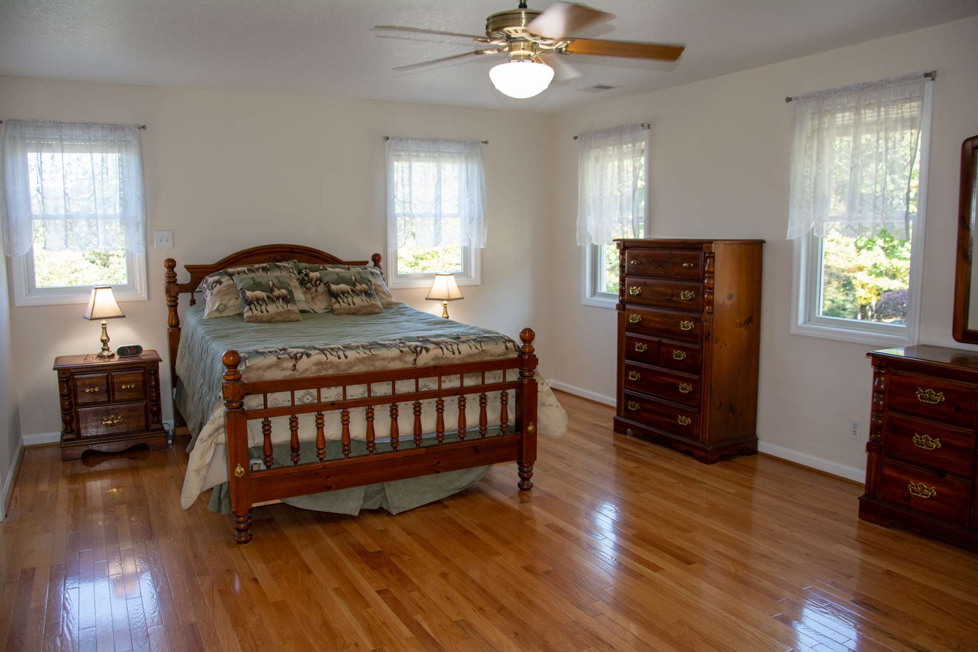 The sizeable master suite is located on the upper level and features 5 windows.
