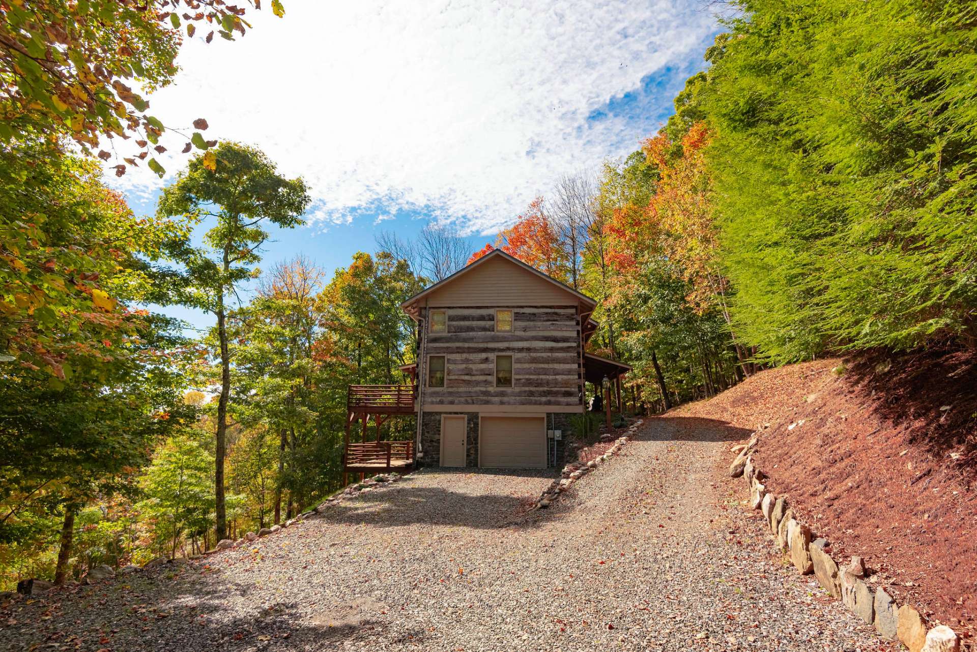 The approach allows you to either utilize the garage parking space or drive up to the front door.