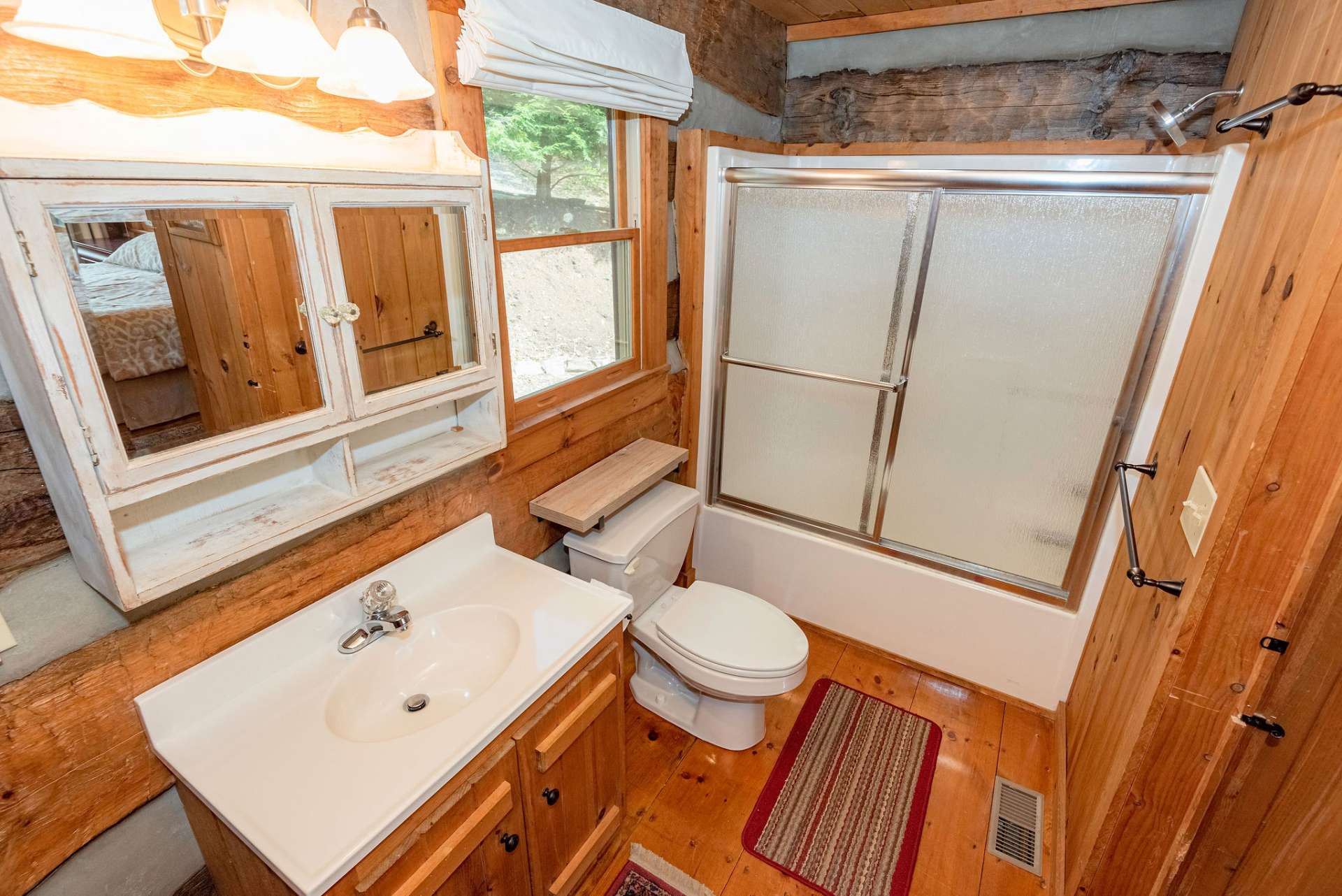 Master bath serves as main level bath.