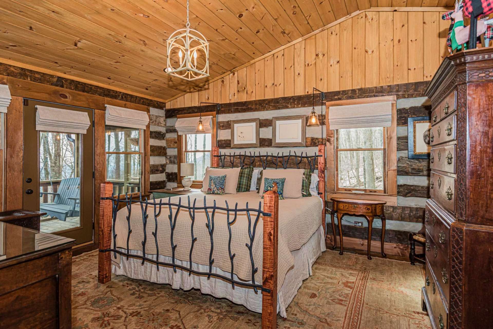 The main level master suite offers convenient access to back screened porch.