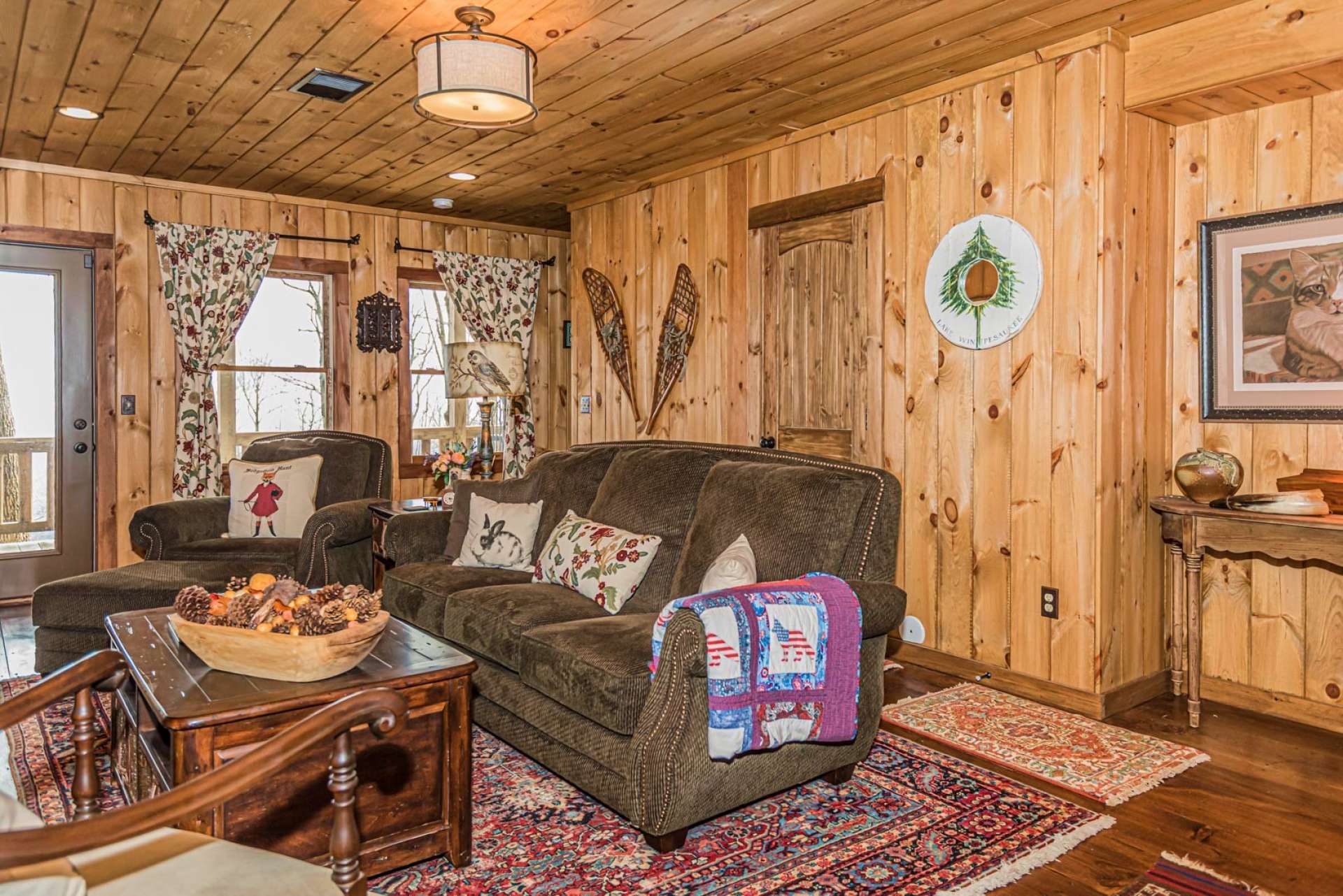 The family room has access to lower level deck, hallway to laundry area and shares a full guest bath with guest bedroom.