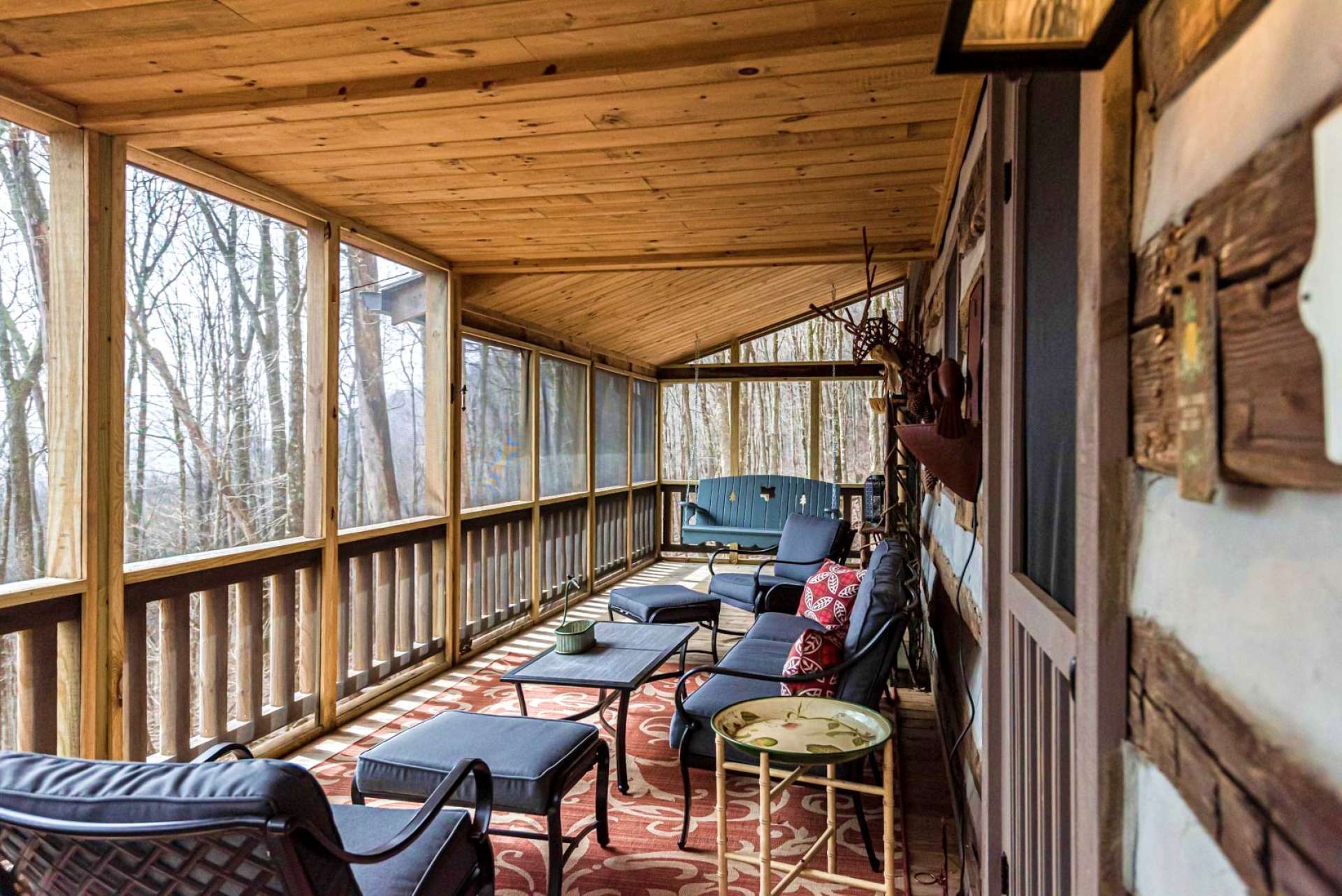 Enjoy the ever changing mountain scenery all year round on this spacious outdoor porch with heavy duty screening.