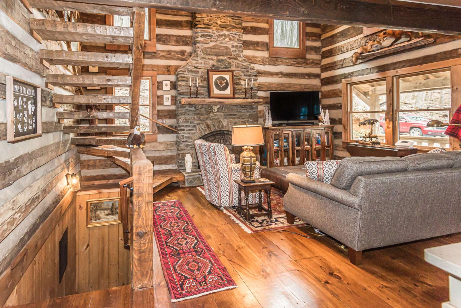 Rustic elegance says it all as you enter into the vaulted great room with numerous windows bringing in abundant light.