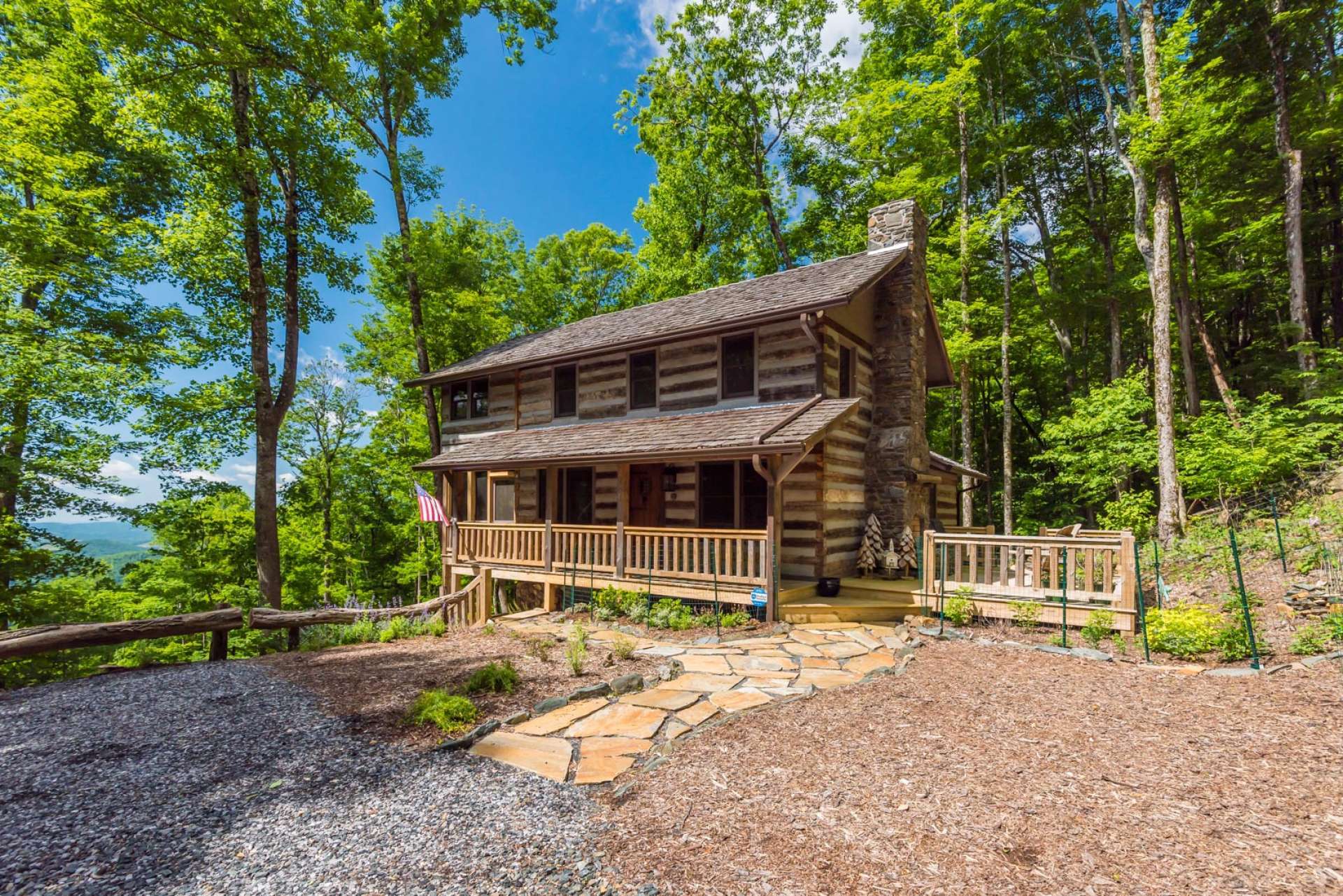 This Stonebridge log cabin estate is located off of Bear Park Drive, Todd area of Southern Ashe County in the NC Mountains.  Ask for more information on listing K153.