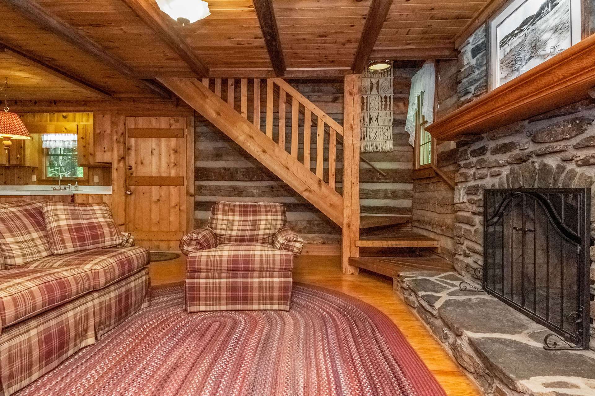 The main level great room offers spacious area to spread out and be together in your own mountain home.