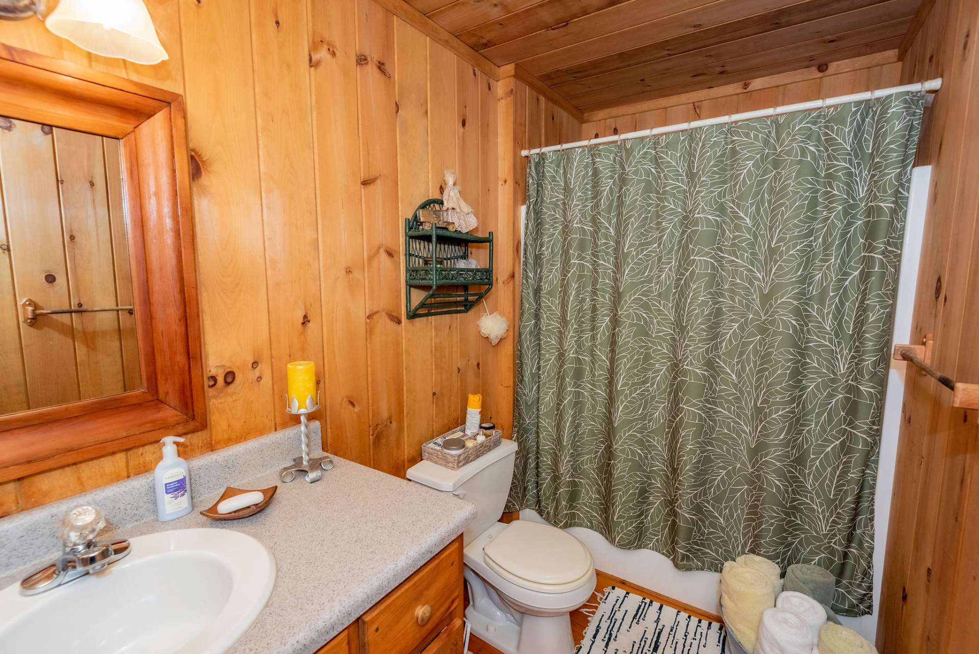 Main floor bathroom just off master bedroom has tub/shower combo