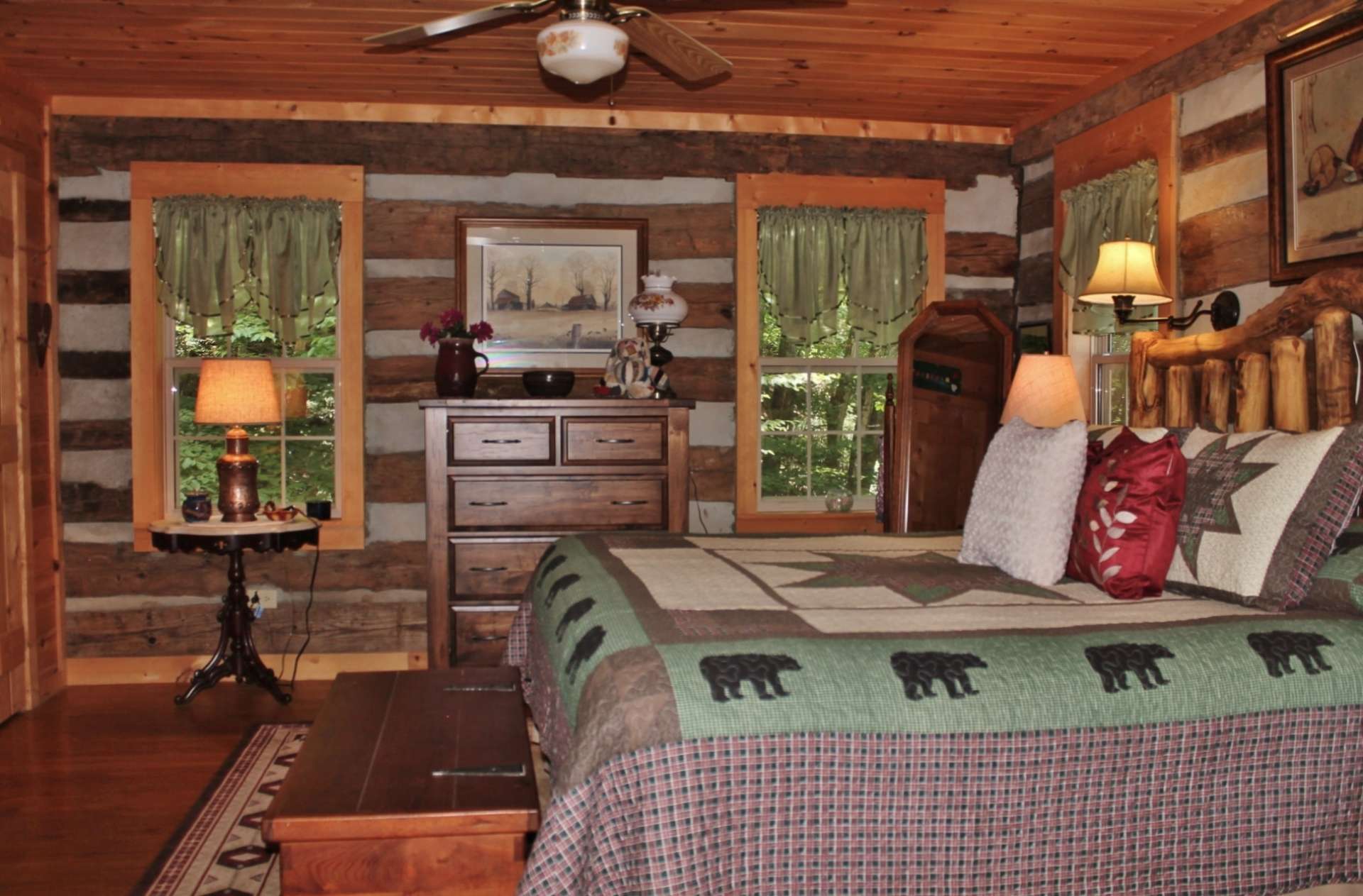 The spacious main level master suite offers plenty of windows and a private bath. Raise the windows and enjoy the sounds of the creek for a restful and peaceful night's sleep.