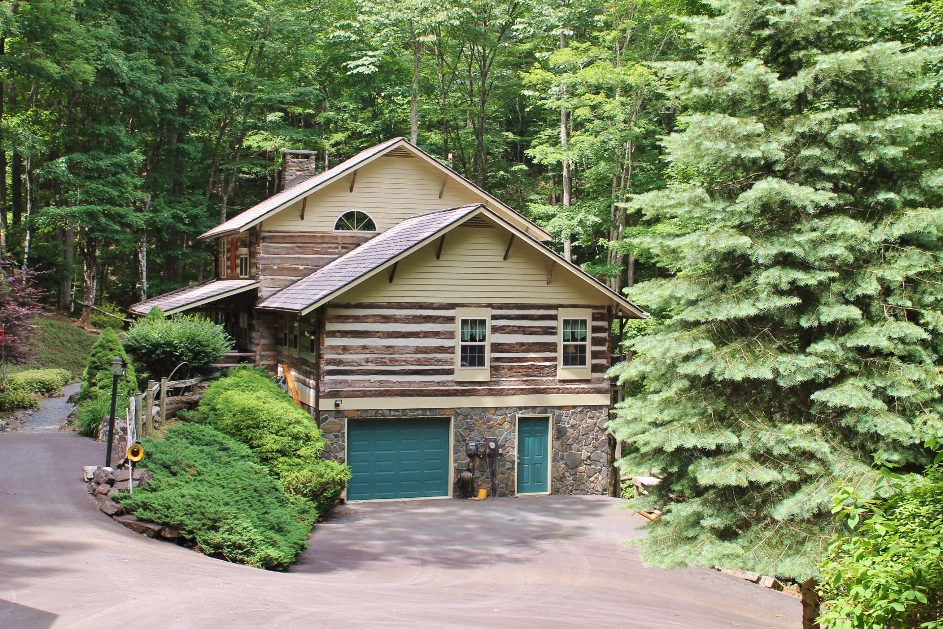 A basement garage, workshop, bunkroom and loads of storage space finish out the lower level. Multiple parking areas are paved.