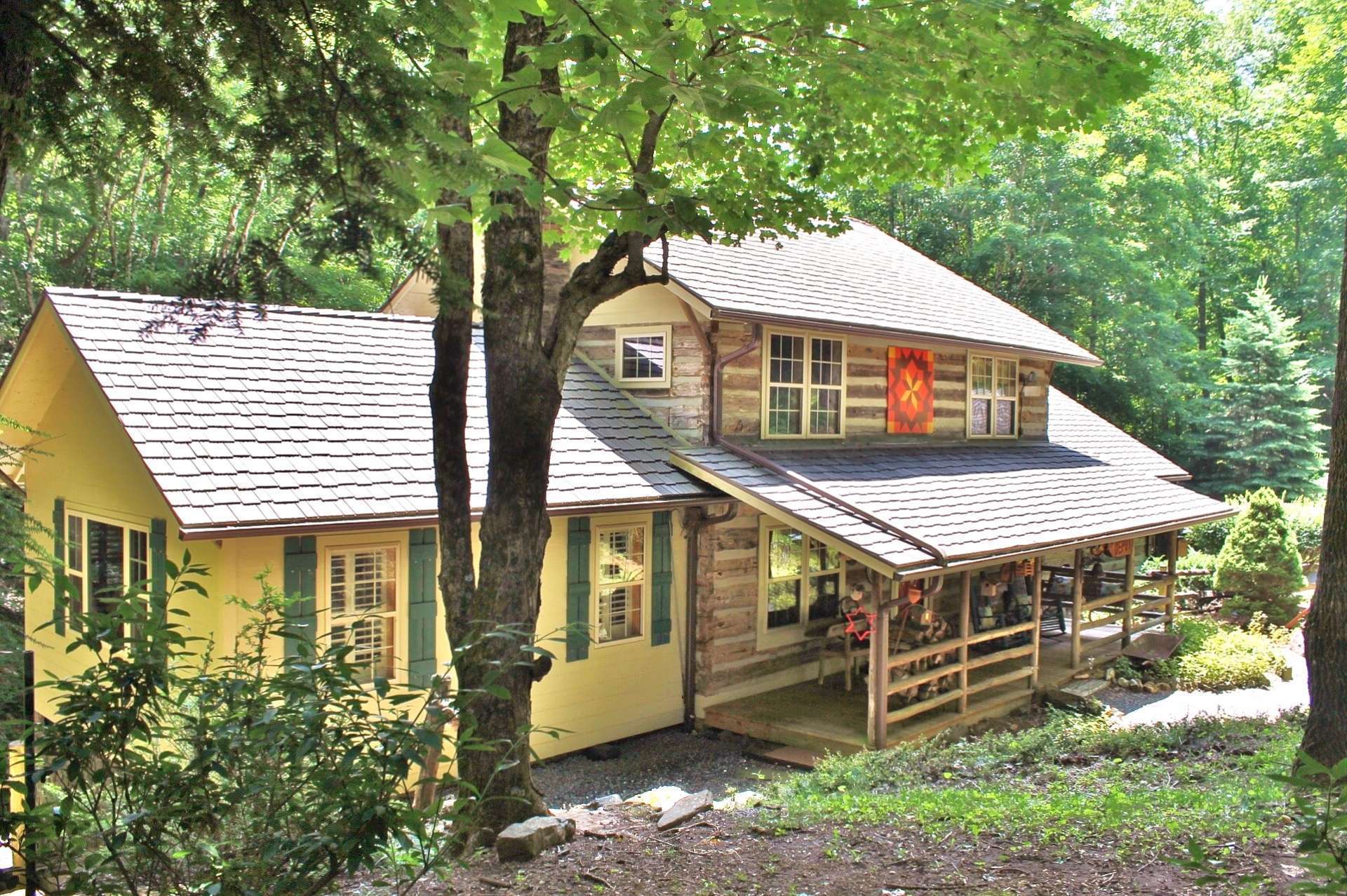 This classic antique 2-bedroom, 2-bath log cabin is located in the desirable Stonebridge community nestled in a private park-like wooded setting with bold rushing creek.