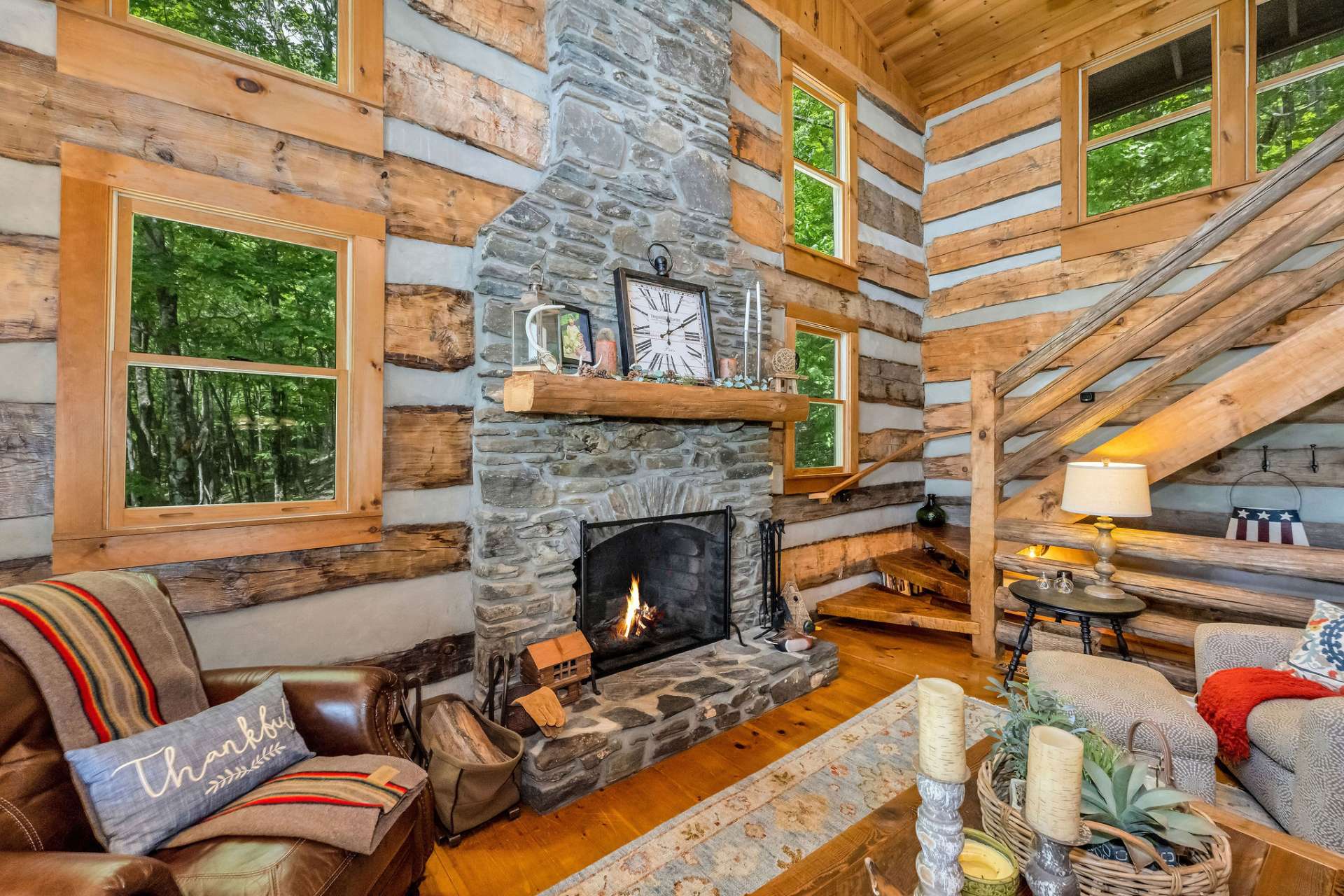 The floor-to-ceiling stone fireplace sets the stage for cozy nights spent with those you cherish the most.