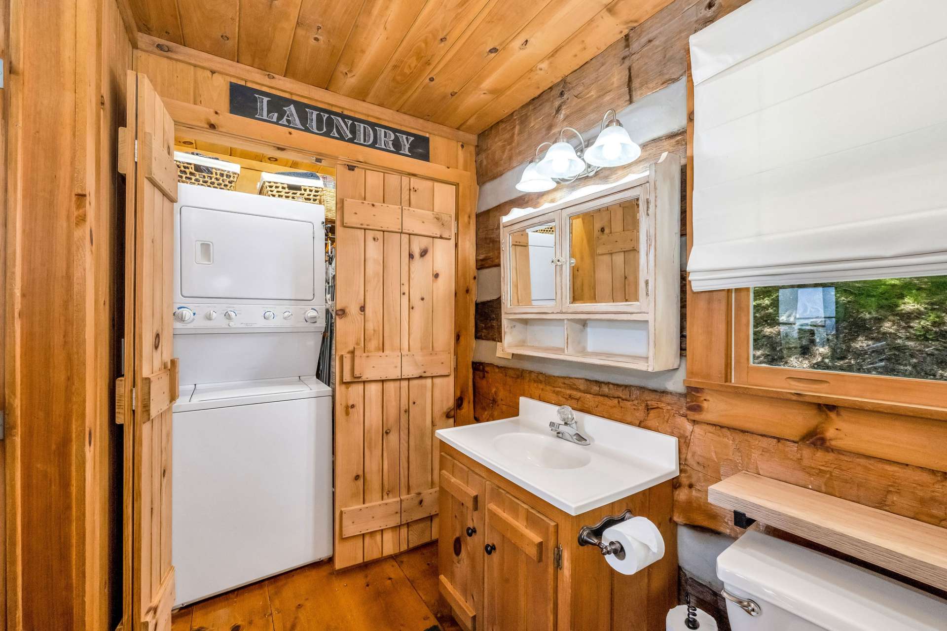 A stackable washer/dryer unit in the primary bath is an added convenience.