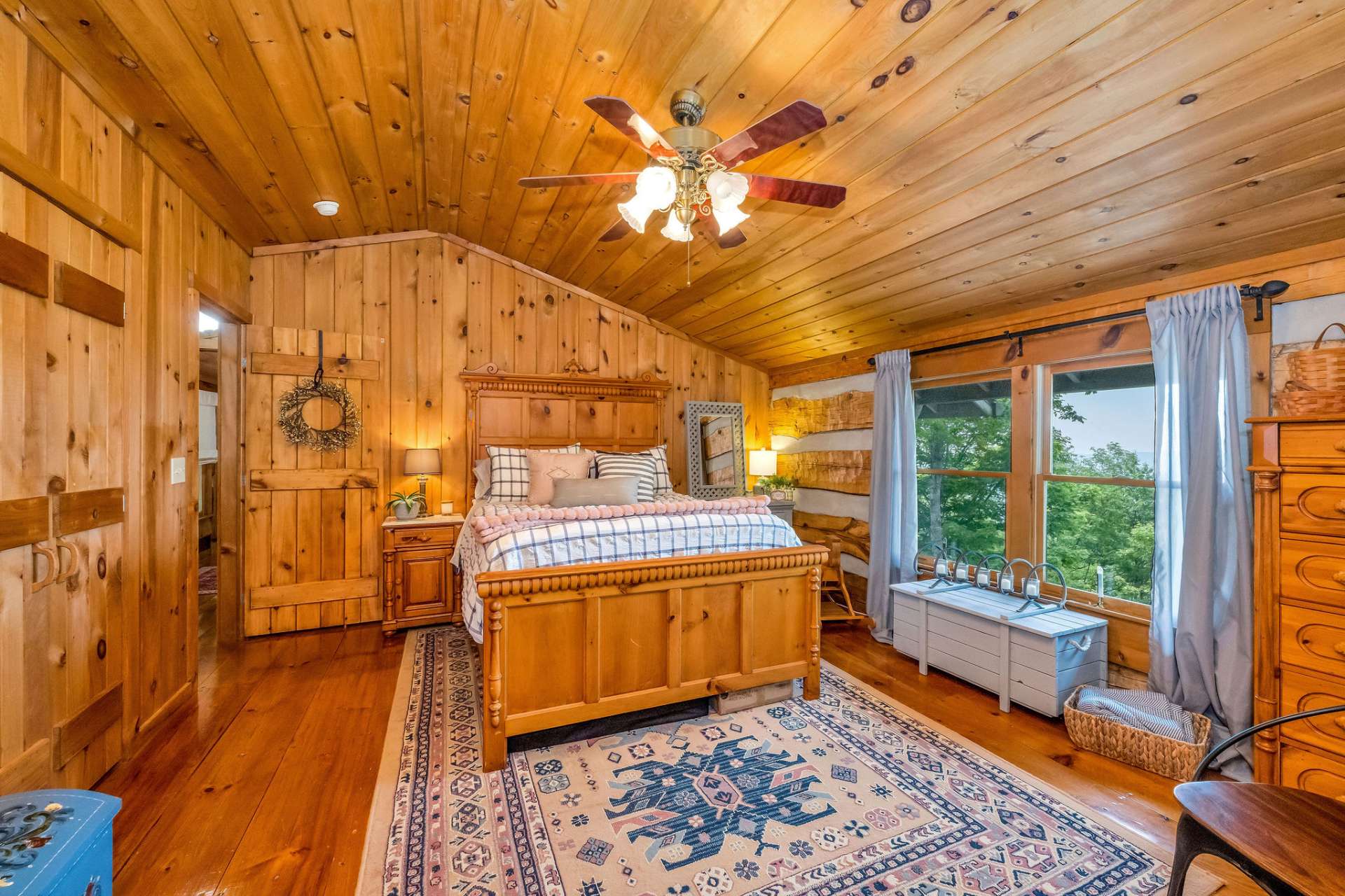 Your guests will open their eyes to the sight of rolling mountain tops just beyond the window.