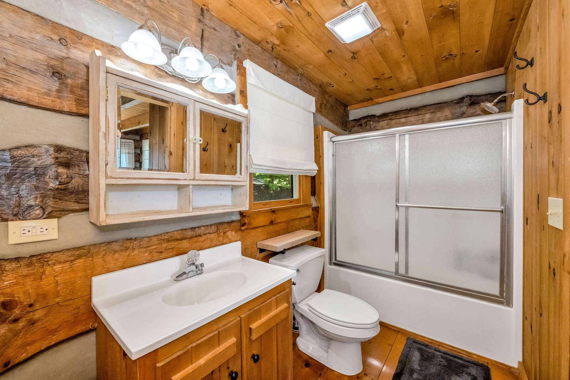 The primary ensuite full bath has a tub/shower combo.