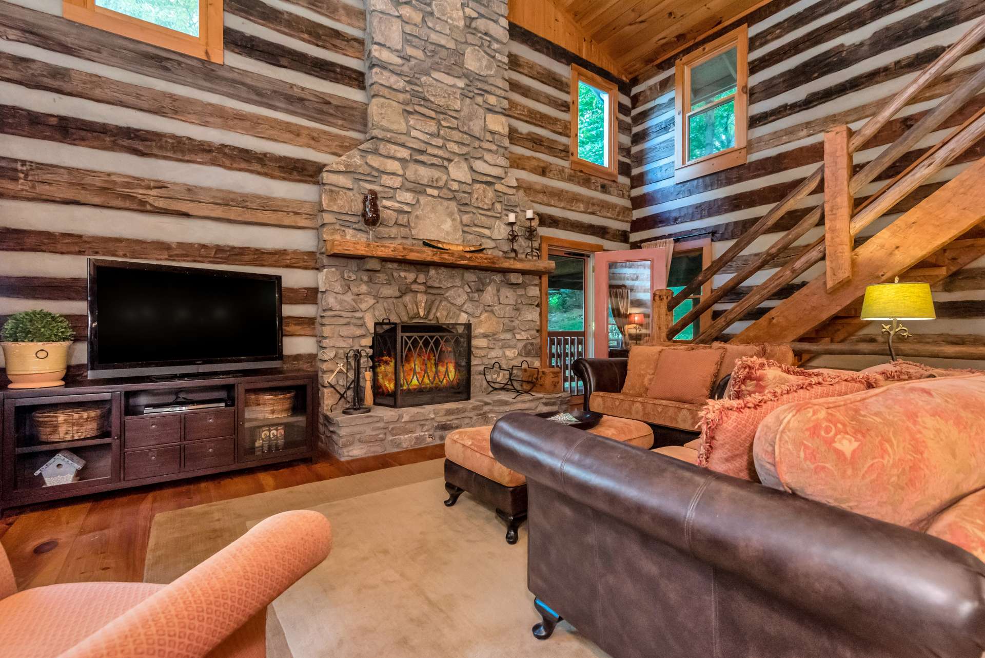This masterly crafted two story stone fireplace is the center piece of the great room.