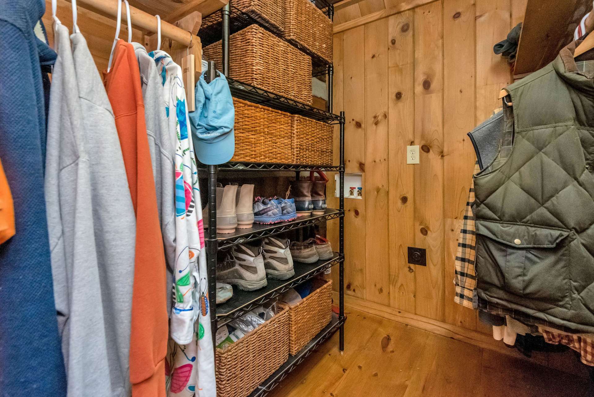 Walk-in primary closet with washer/dryer hookups.