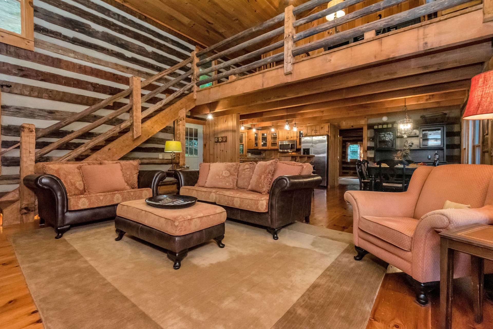 Living room features vaulted ceilings.