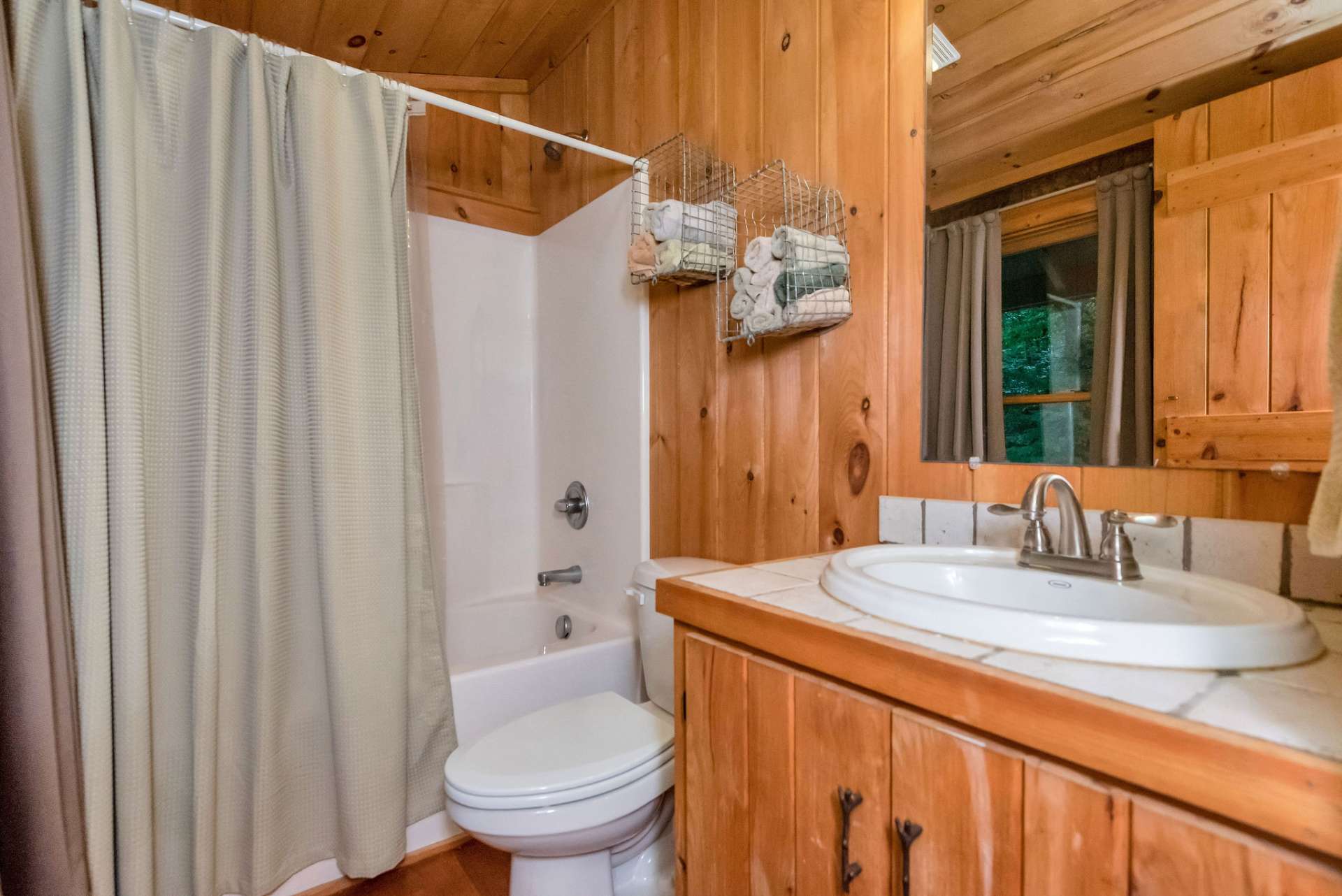 The loft features a full bath for the enjoyment of guests.
