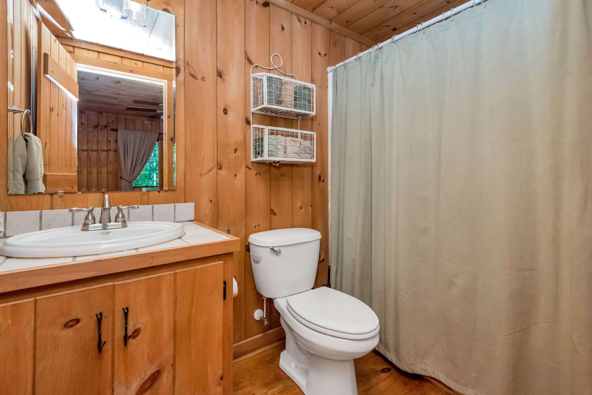 A third full bath complements the family room.