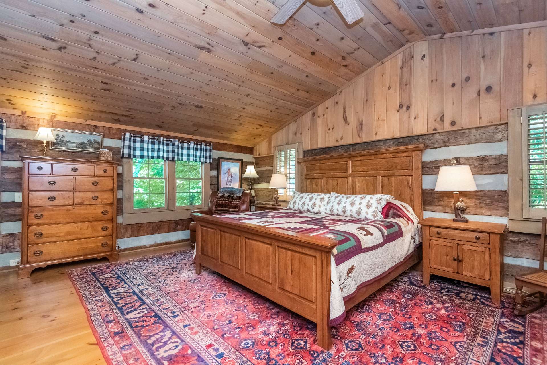 Vaulted ceilings continue into the spacious master suite.