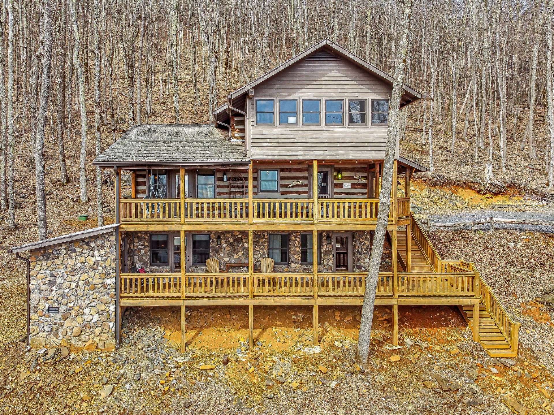 Additional highlights include a whole-house generator, and a storage room on the lower deck, providing ample space for storing outdoor gear and essentials.