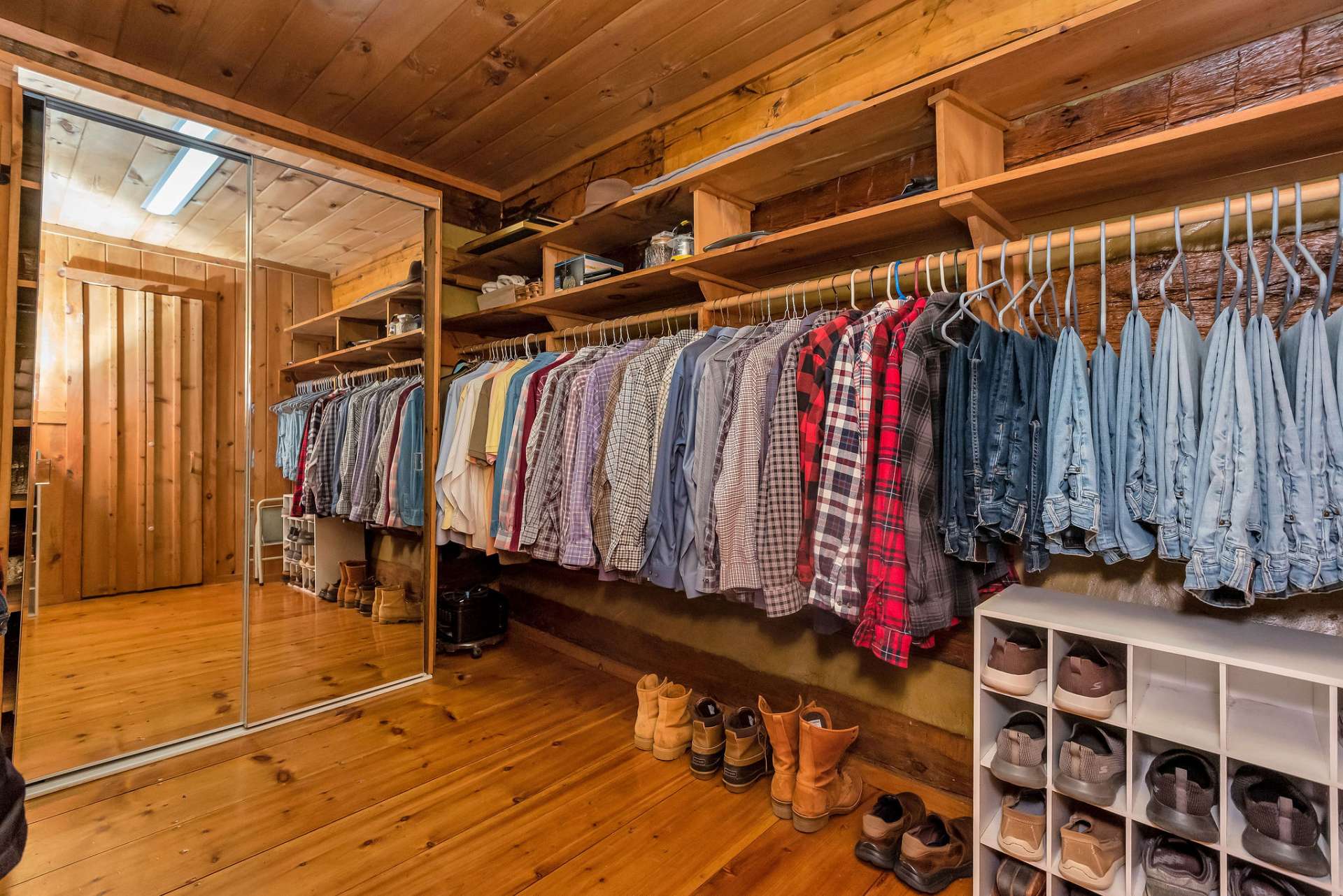 Tucked away off the master bath is your walk-in closet with built-in shelving and a wardrobe with floor-to-ceiling mirrors.