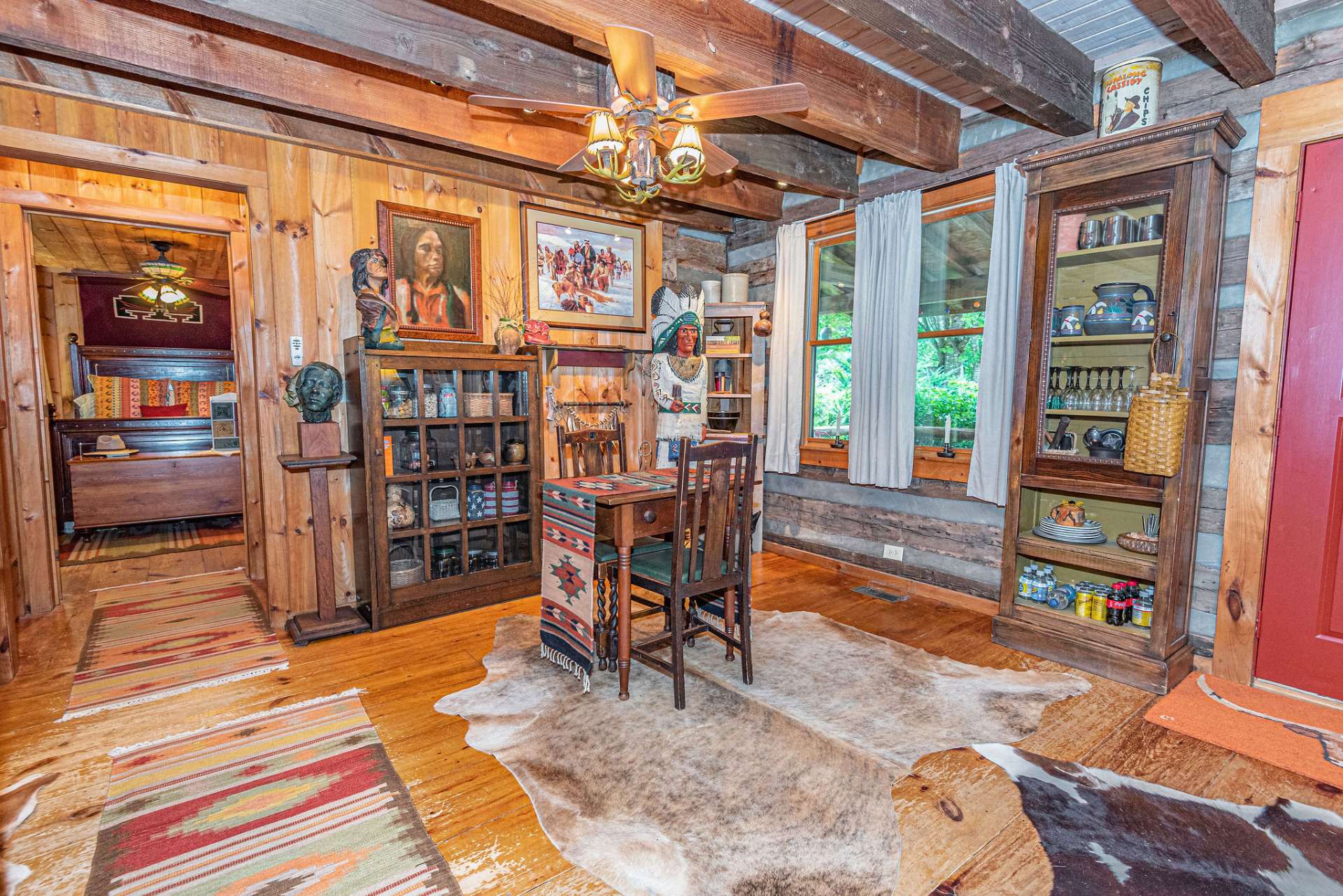 Great little space for intimate dining, reading a book or planning the day's events. The hallway to the left leads to a stairway to lower level and also the main level bedroom and bath.