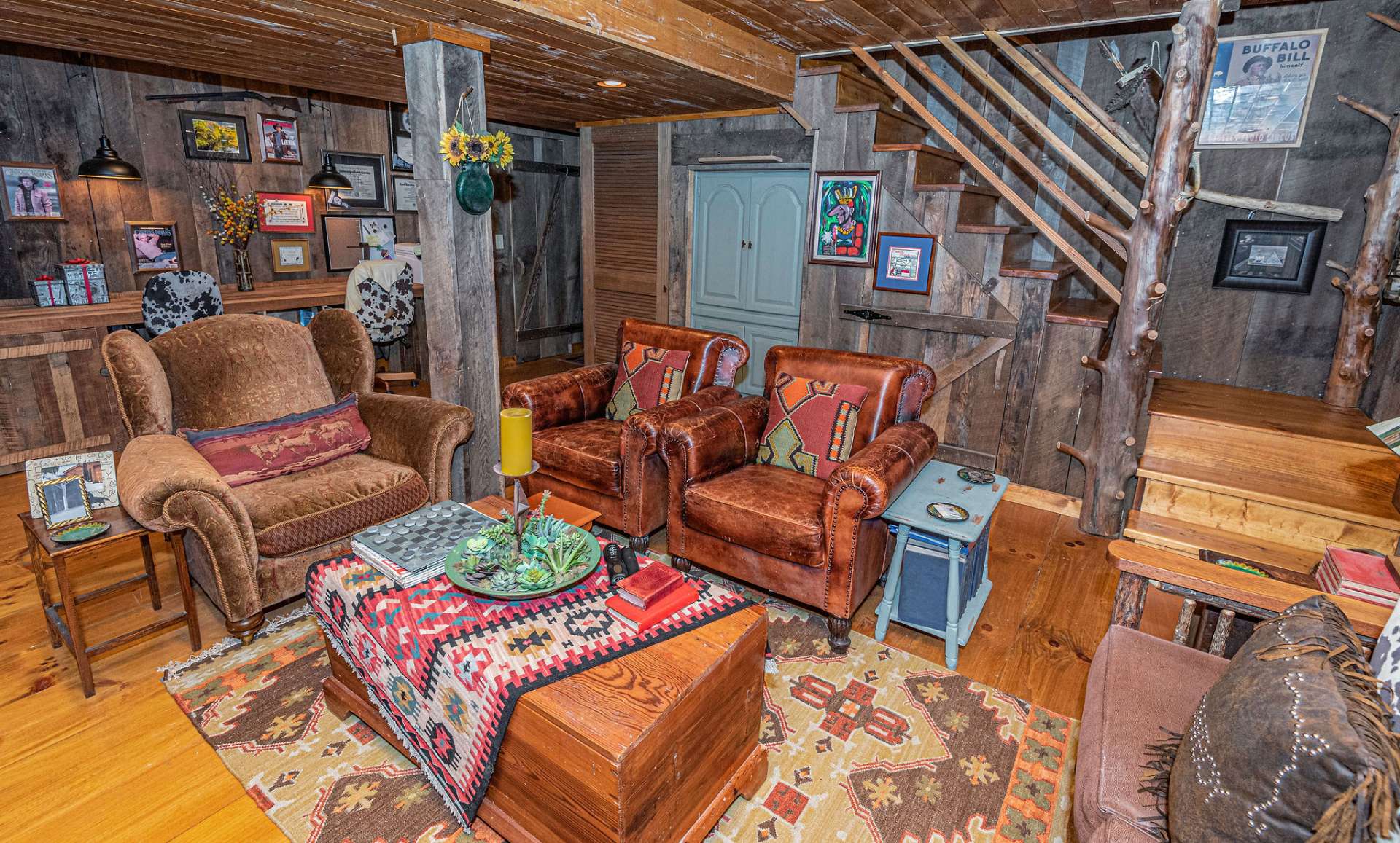 Lower level bonus room has been uniquely finished with reclaimed barn wood