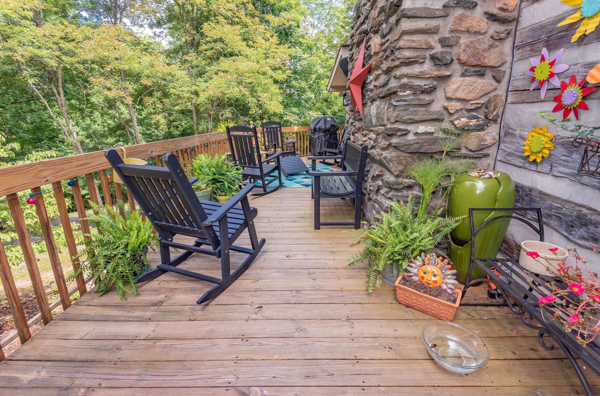 Side deck is a perfect place to set up a barbecue grill and enjoy a favorite beverage with friends.