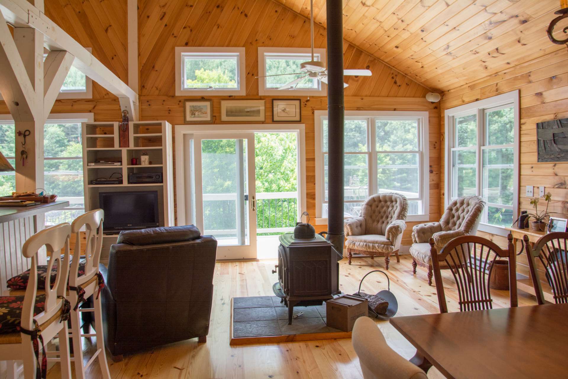 Numerous windows fill the home with natural light and the beautiful views of surrounding mountains.