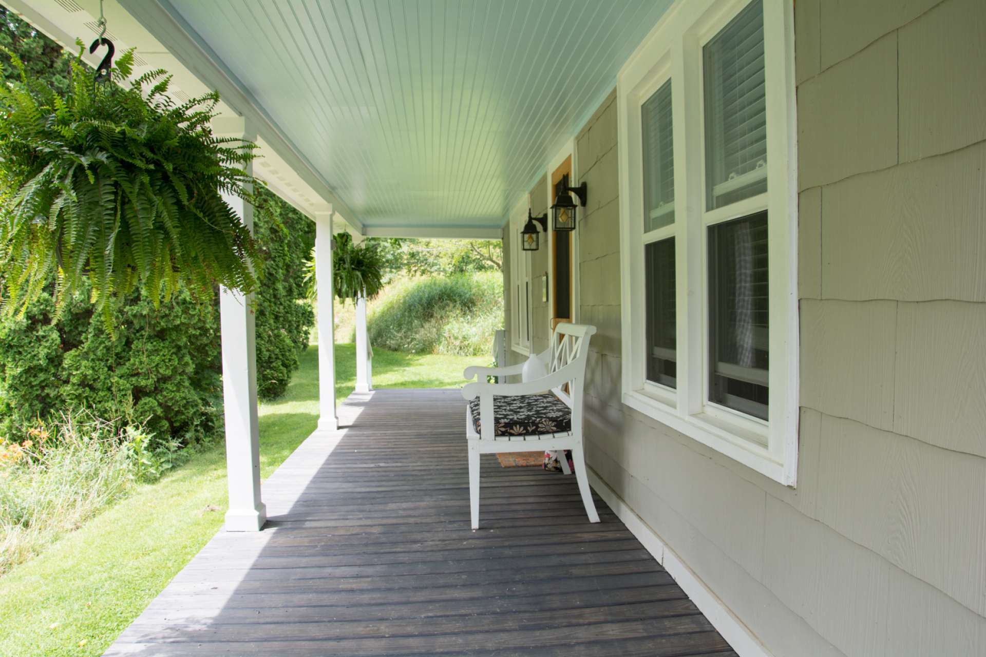 Complete with the typical farmhouse covered porch.