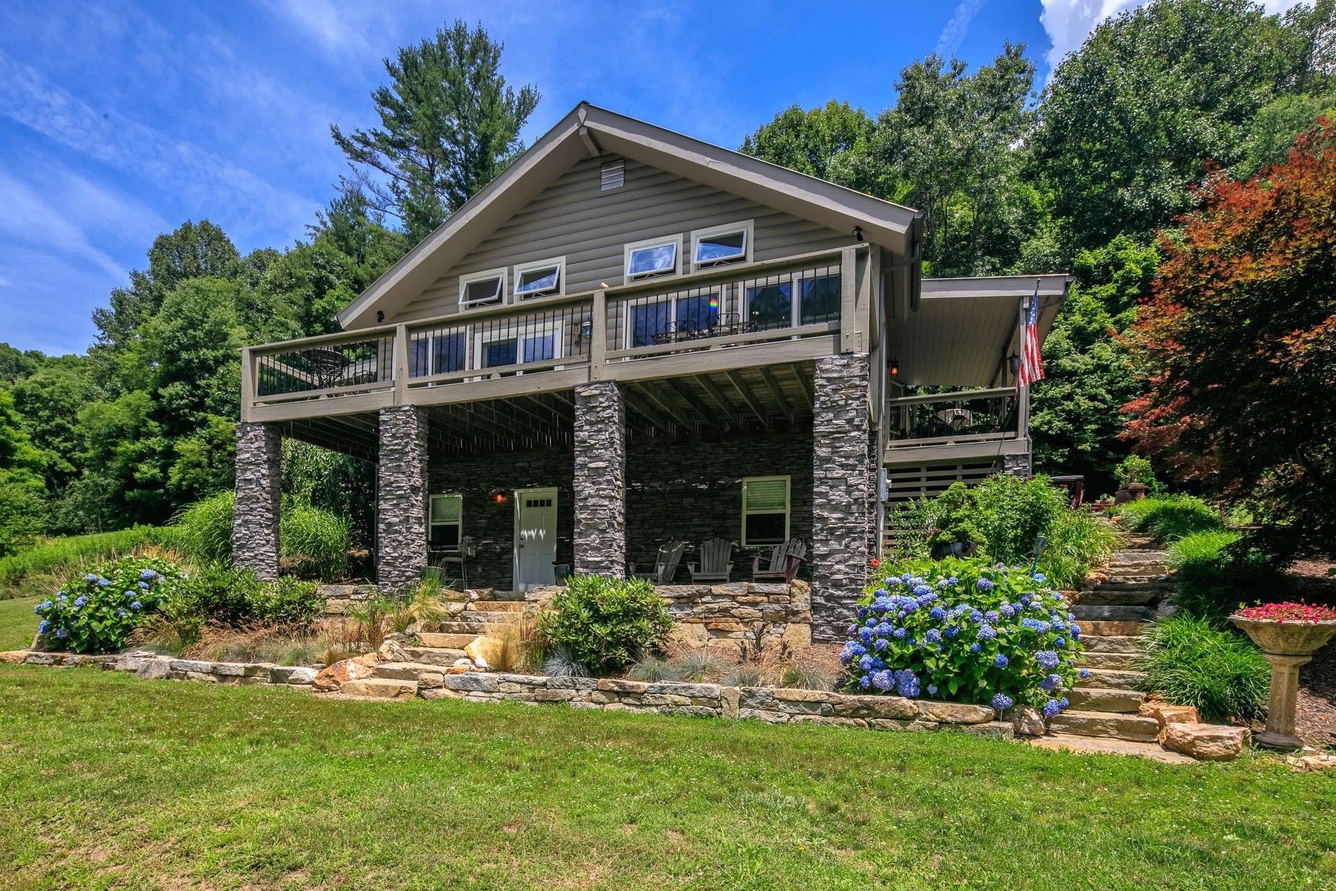 Offered at $465,000, this elegant mountain home with rustic accents and gorgeous 19 acre setting is ideal for your NC Mountain estate or weekend getaway.  Call today for additional information on listing R188.