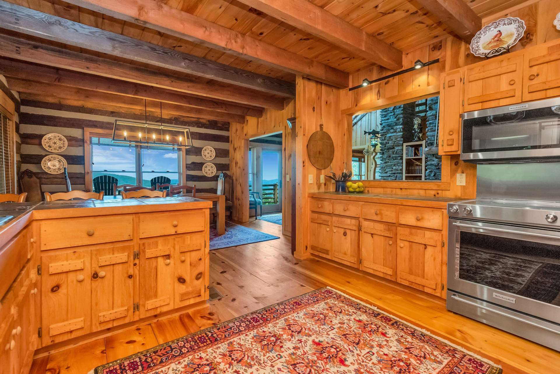 Kitchen provides stainless appliances and slate counter tops.