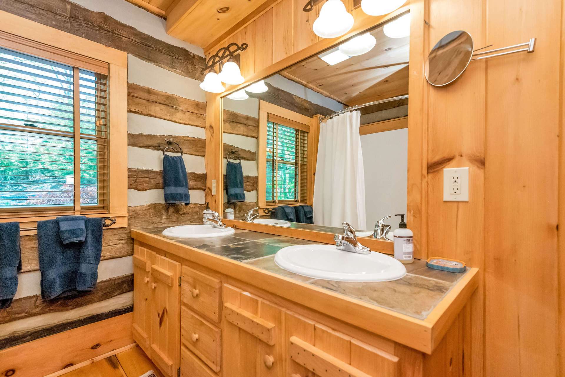 Master bath provides double vanity and tub/shower.