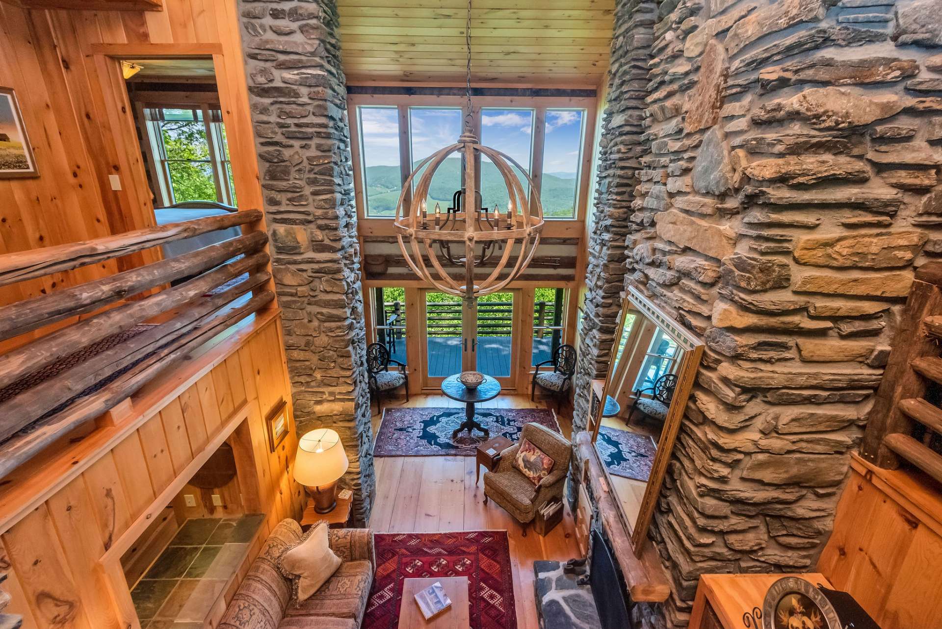 The soaring vaulted ceiling and stone columns are rustic, yet elegant.