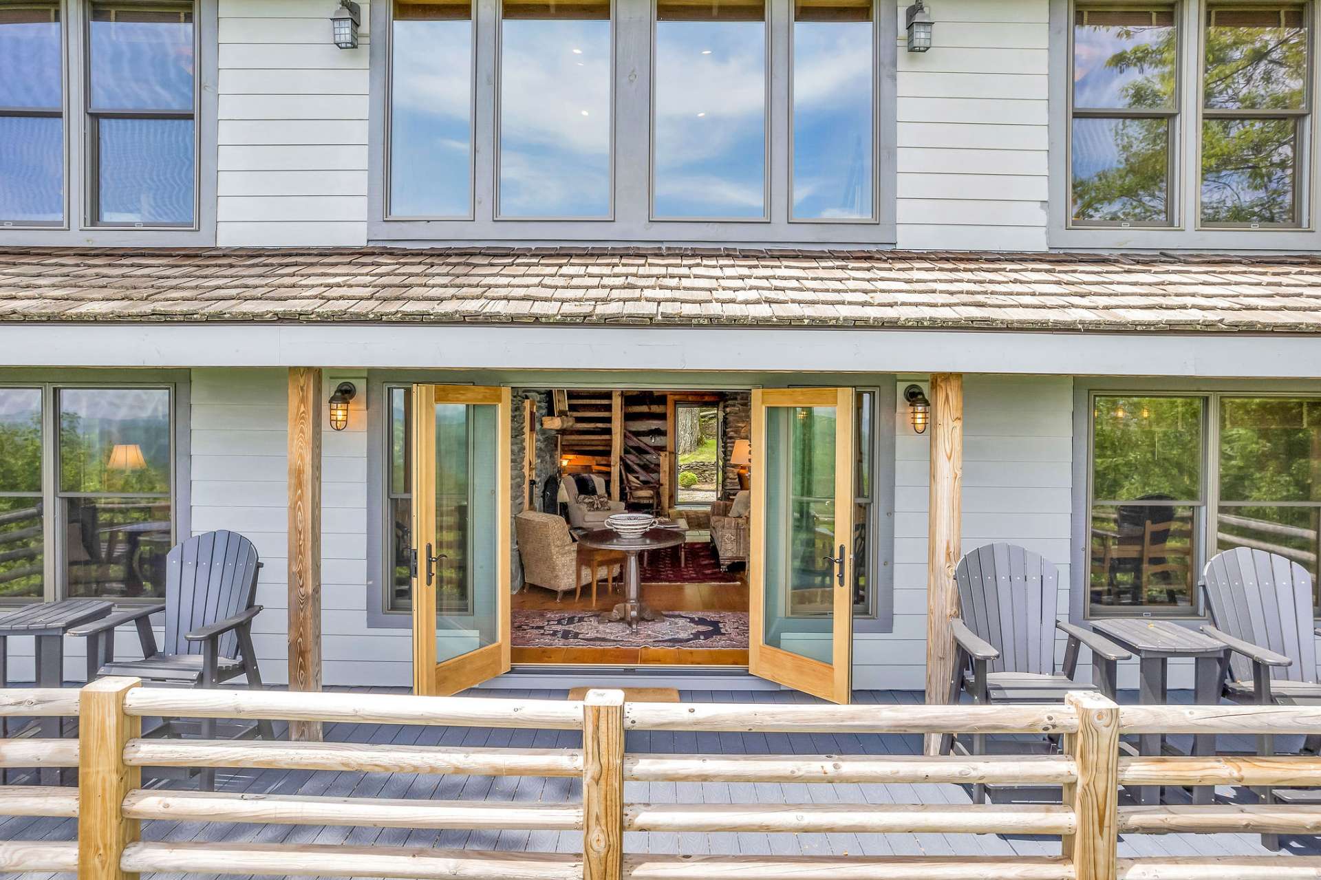 Greatly expand your living space three seasons of the year with approximately 1400 sq. ft. of decks & porches.