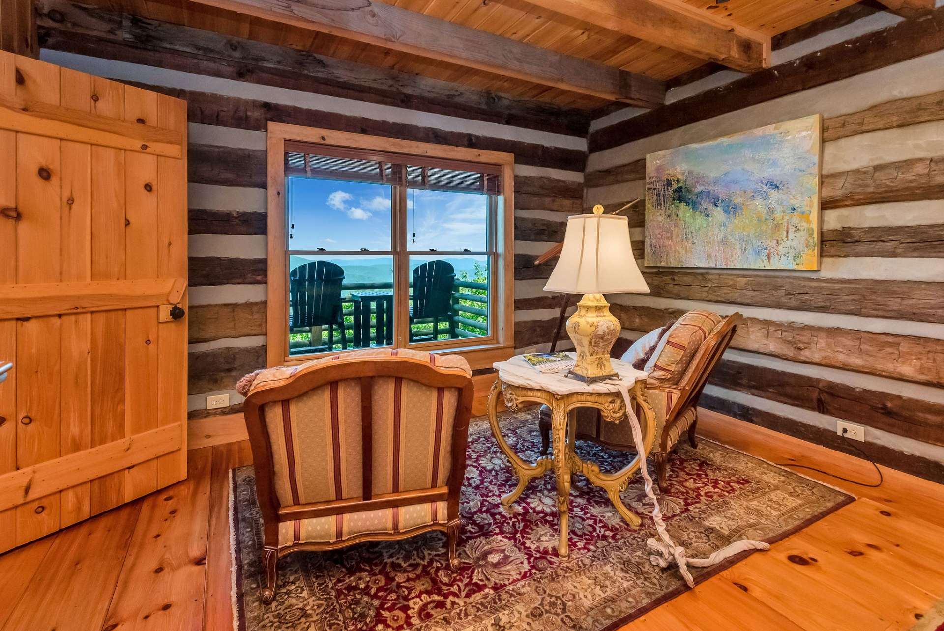 Master suite is spacious enough to also provide this cozy sitting area. You may find it hard to concentrate on your book with the amazing view through the windows.