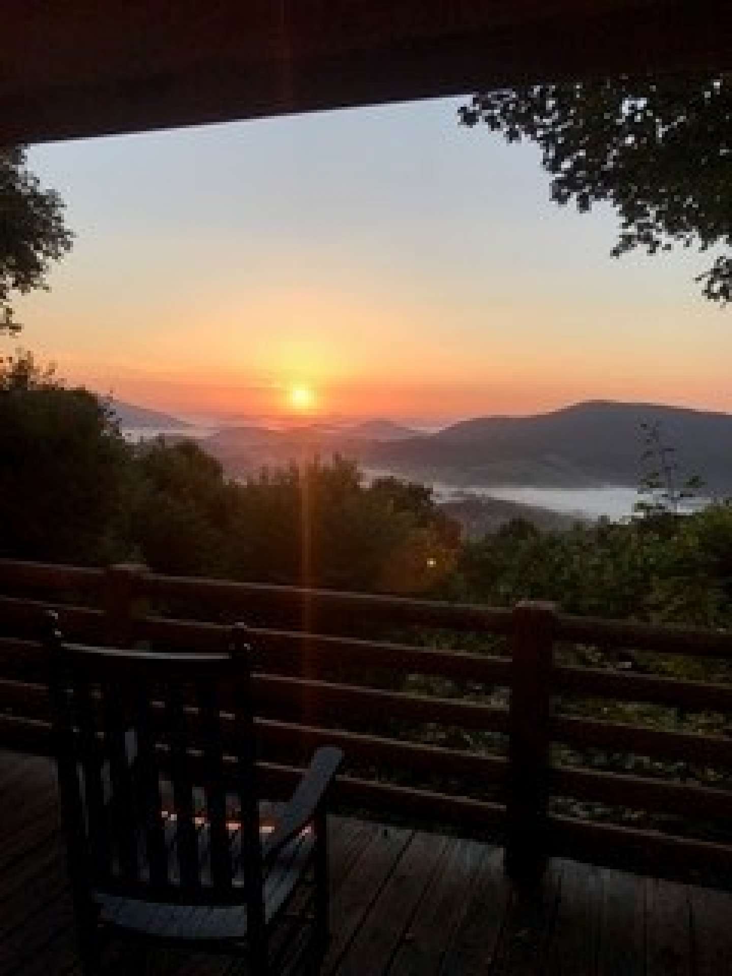 This sunrise photo was taken by the owners on their first morning waking up in this "memory maker" Stonebridge cabin.