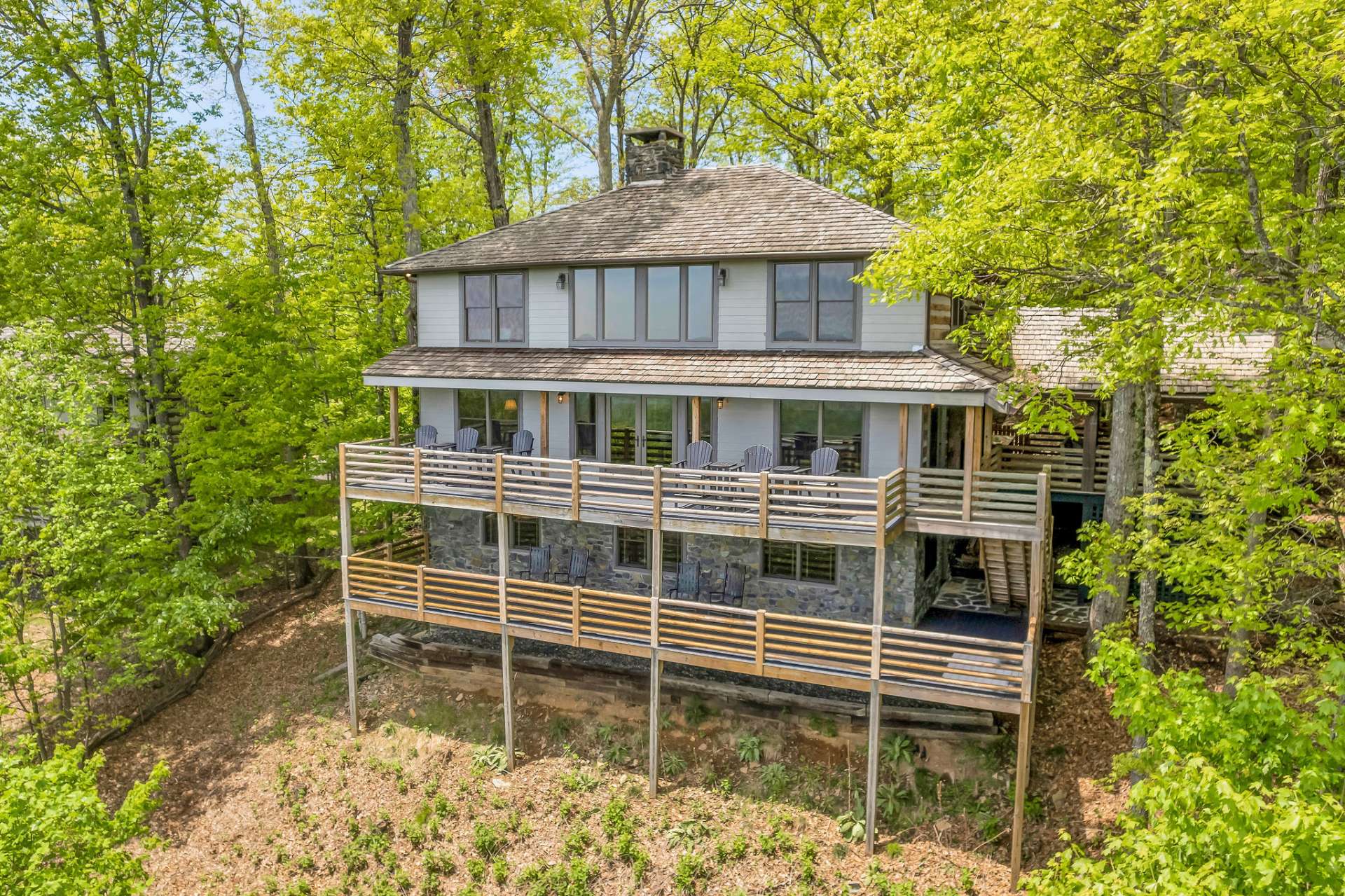 Fiber cement board siding and Trex decking out back to minimize future maintenance. You will also appreciate the new Pella windows and doors the owners had installed.