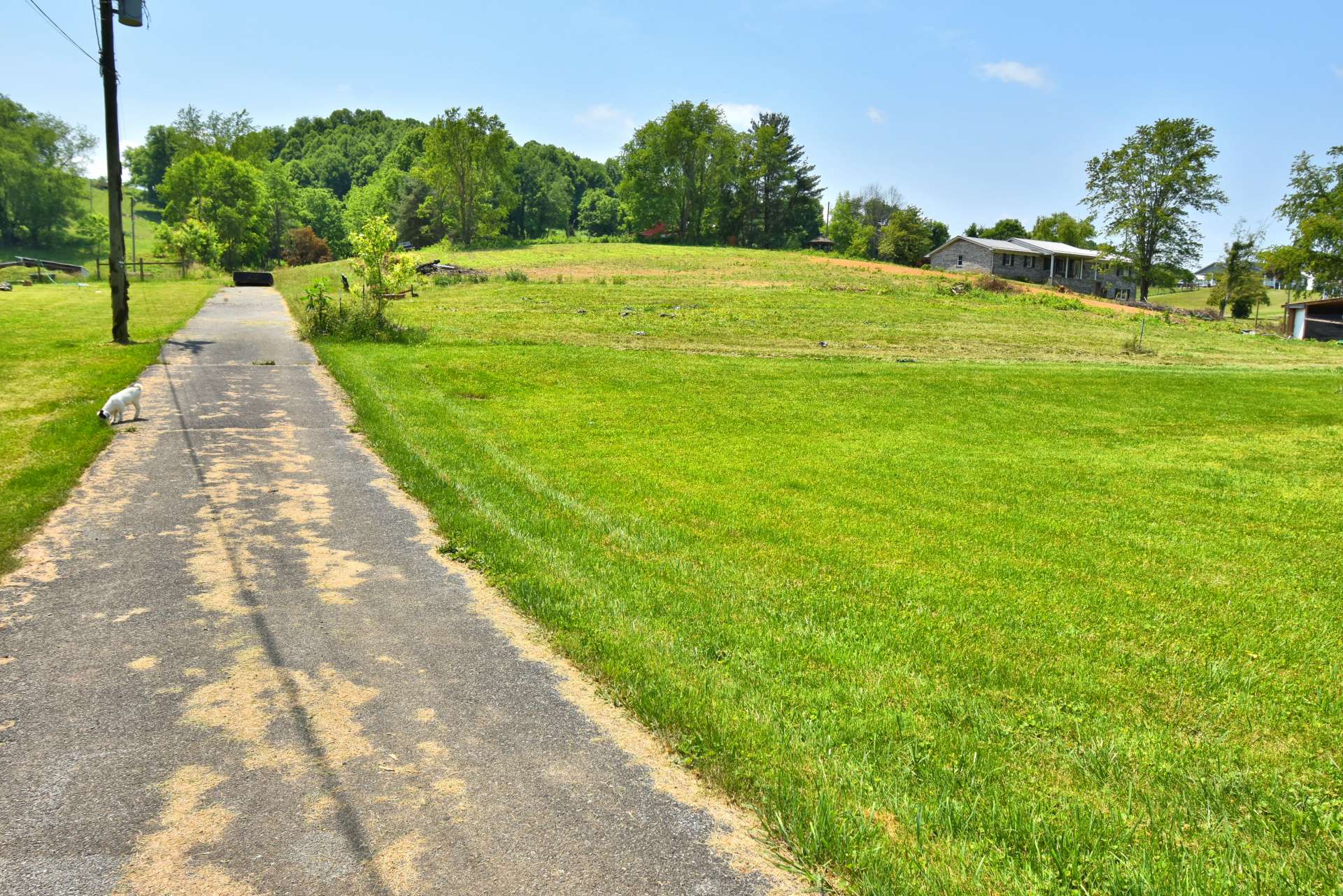 Paved driveway from state maintained road.