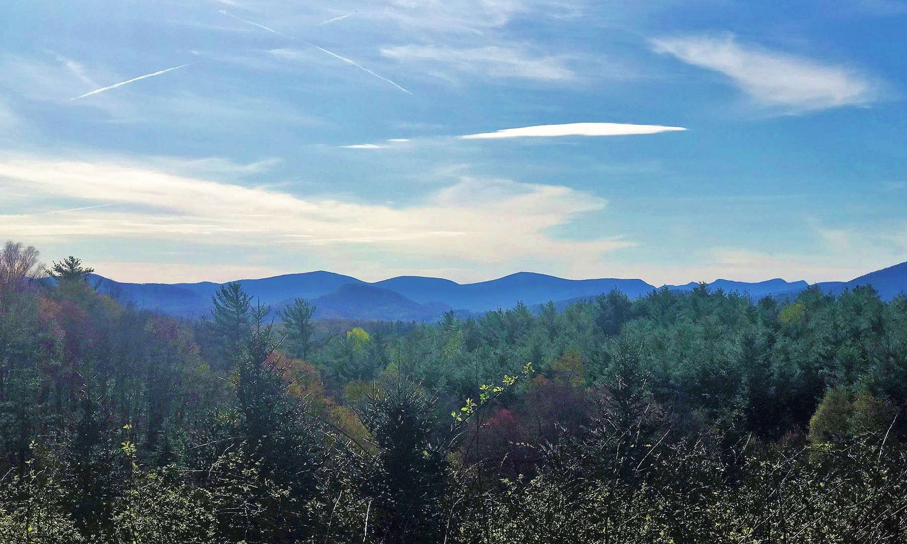 Looking for the ideal location to build your dream NC Mountain cabin or home? Take a look at this unrestricted 2.85 acre parcel with fabulous layered long range mountain views located just off the Blue Ridge Parkway in the Glendale Springs area of Ashe County.