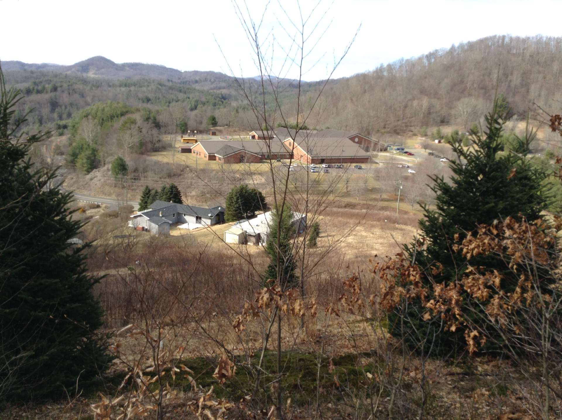 The owner also provided this photo showing the view of the school from the land.