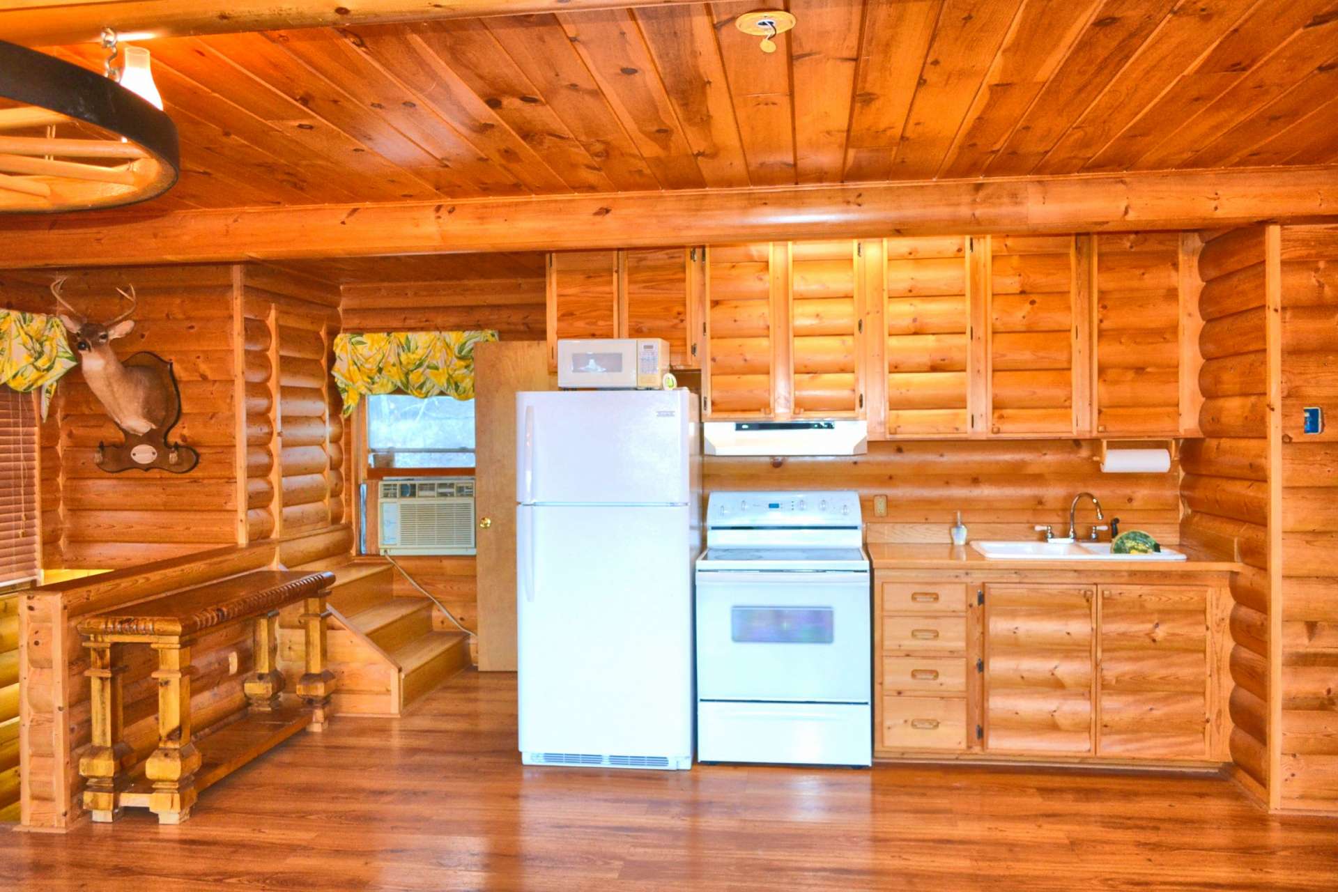 The kitchen space allows for ample work and storage space.