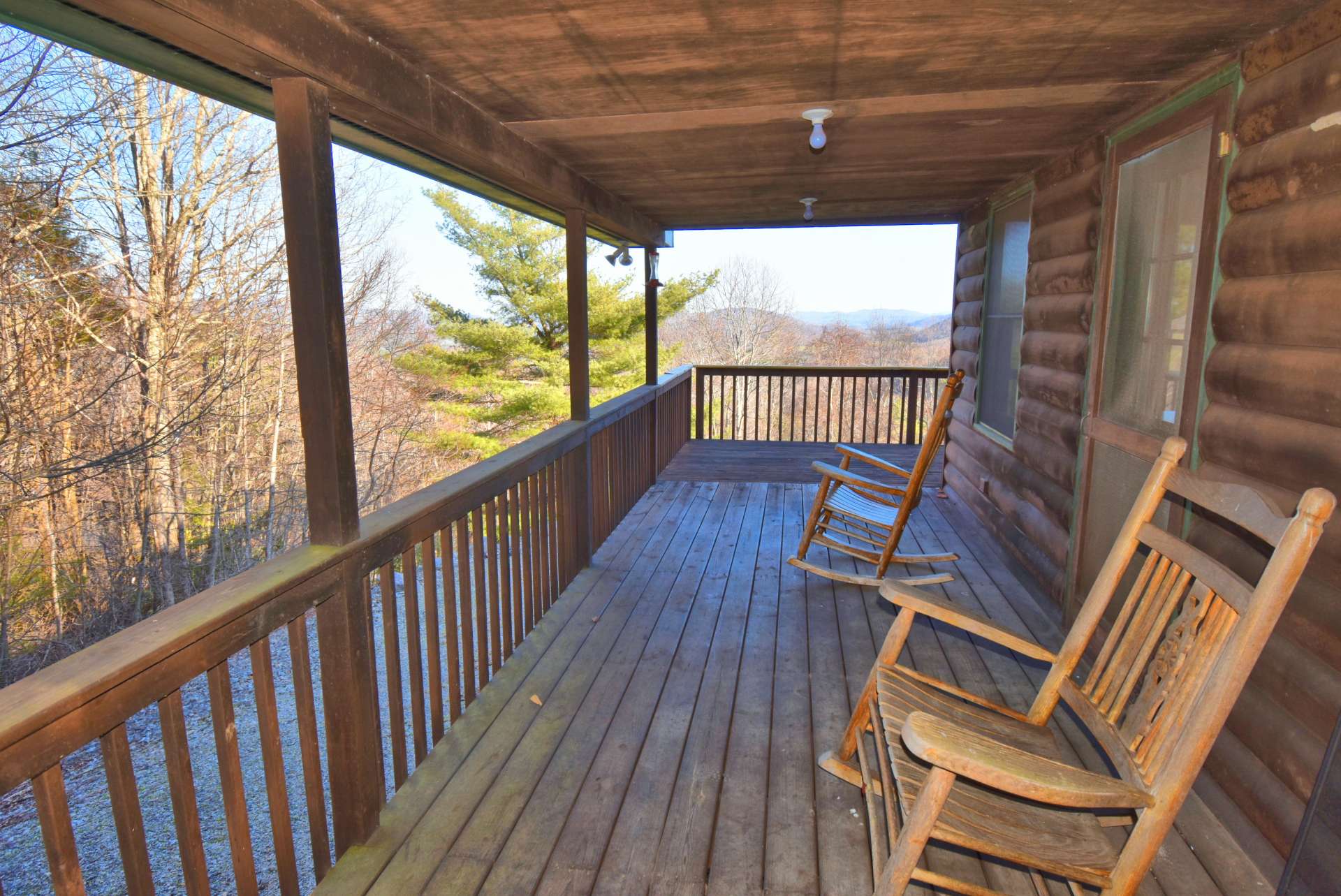 Relax on the covered front porch and enjoy the views and the sounds of Nature all around you.