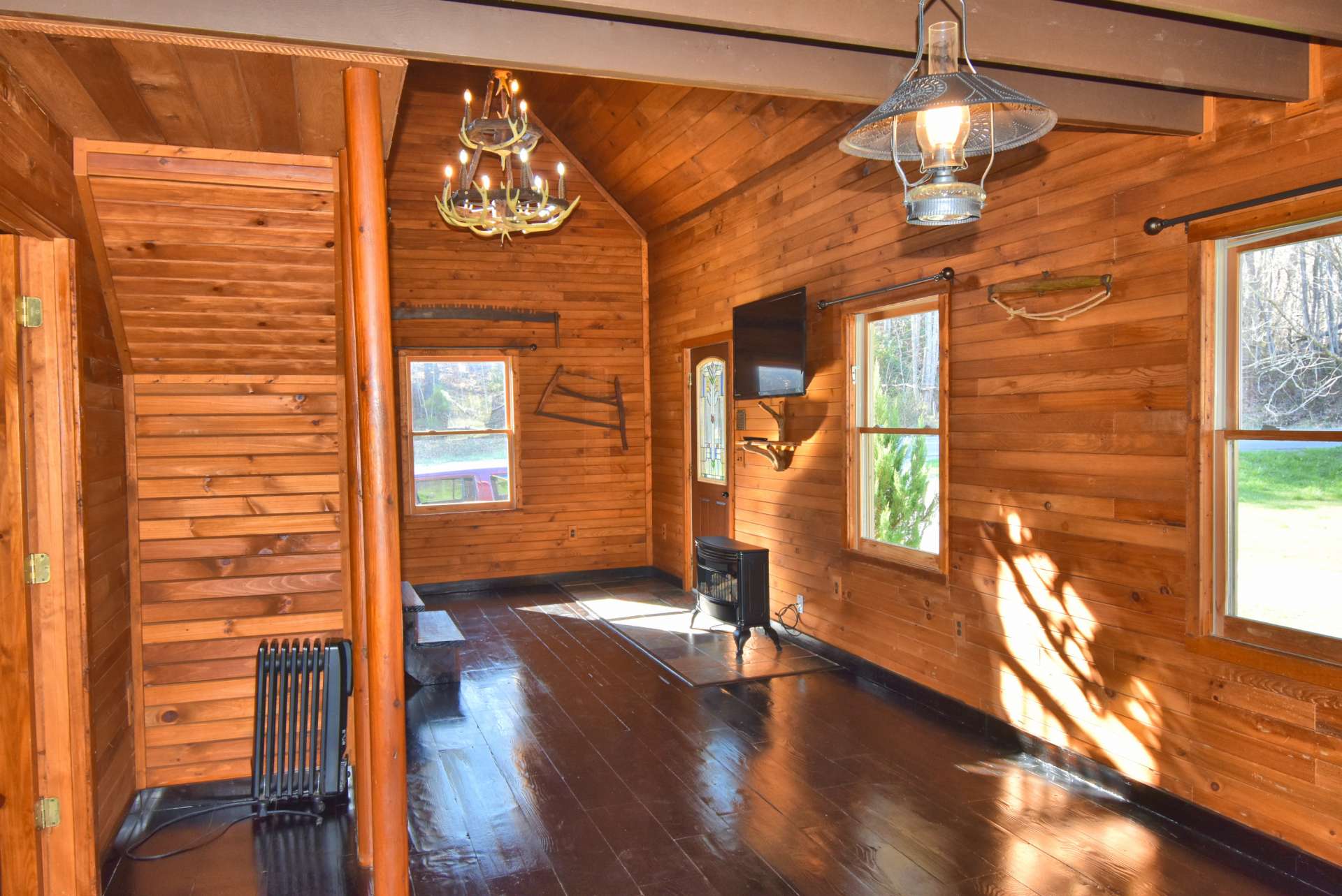 Exposed beams add to the cabin feel.