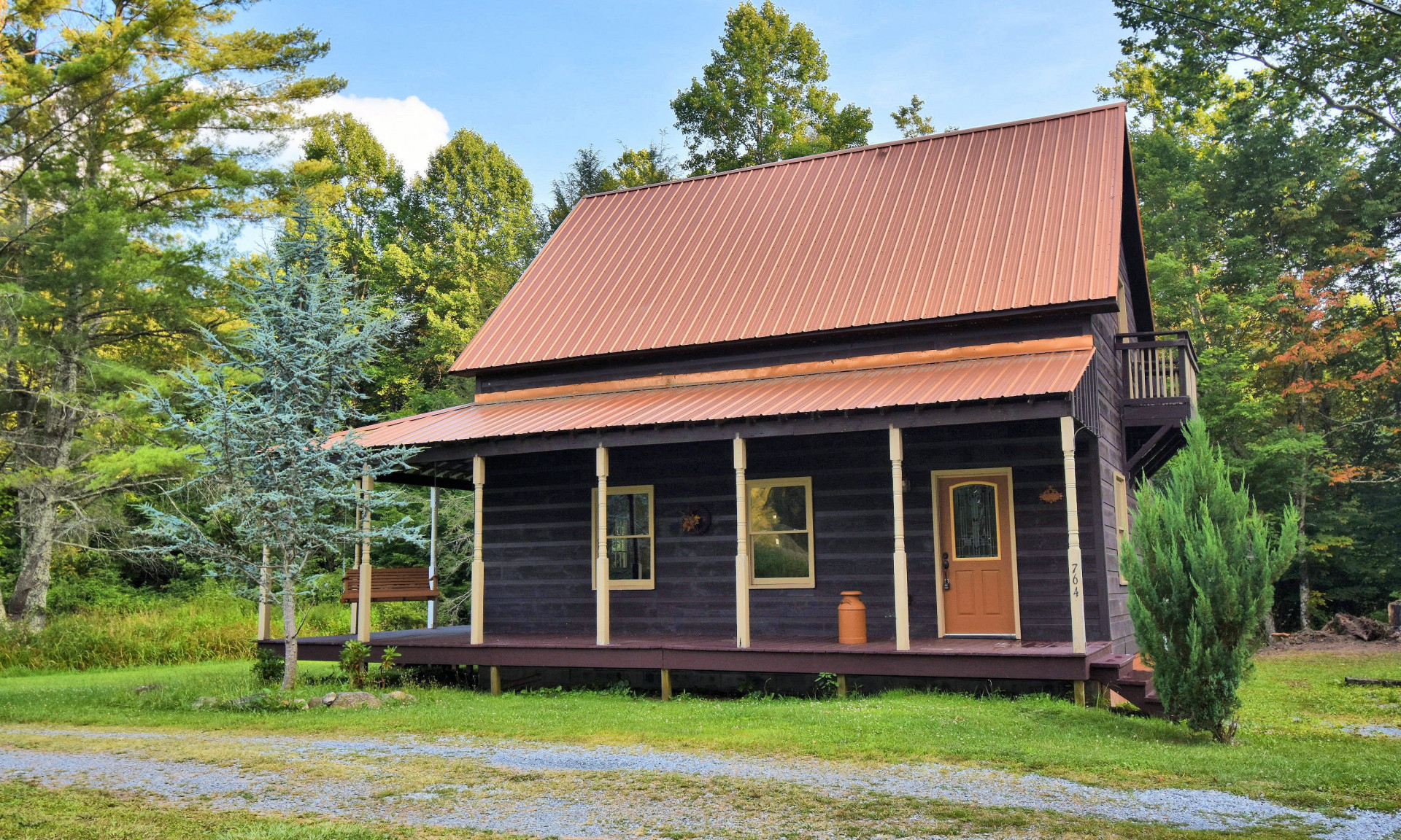 Enjoy all amenities of Laurel Creek and the Damascus area with this sweet mountain cabin offering easy access and frontage on Whitetop Laurel Creek.