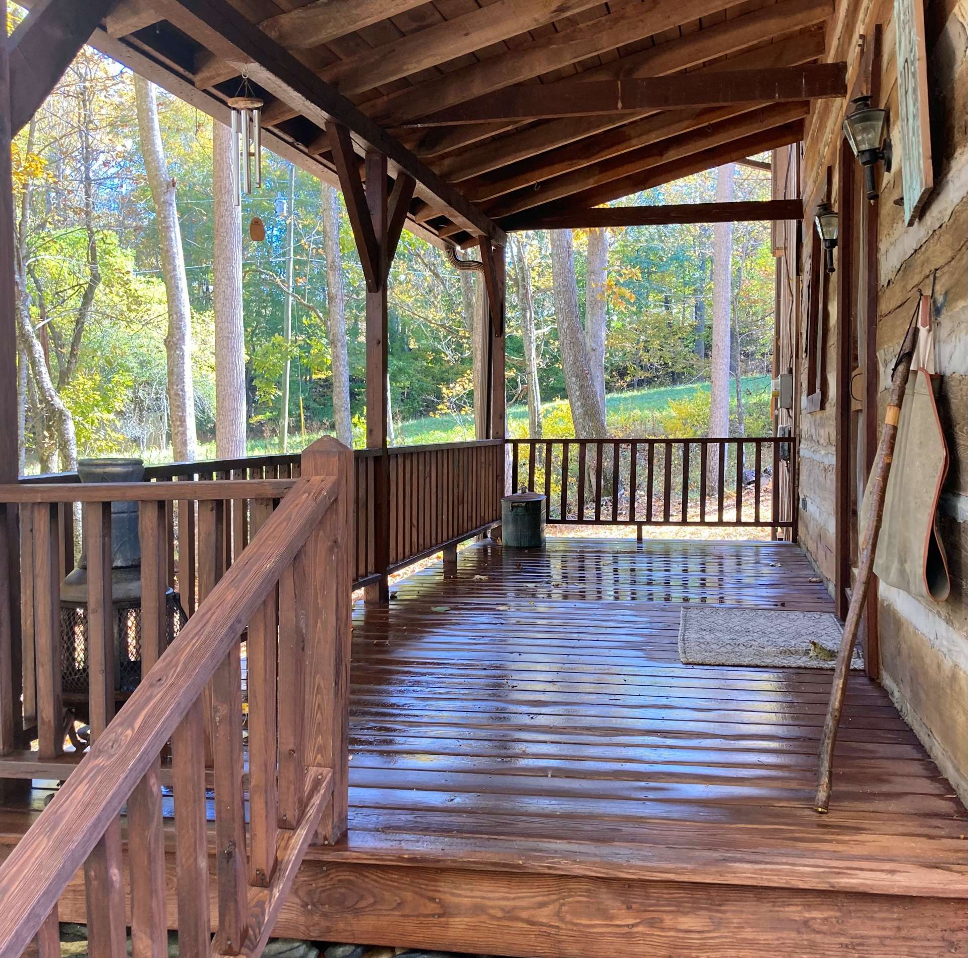 Cozy covered back porch perfect for reading or relaxing