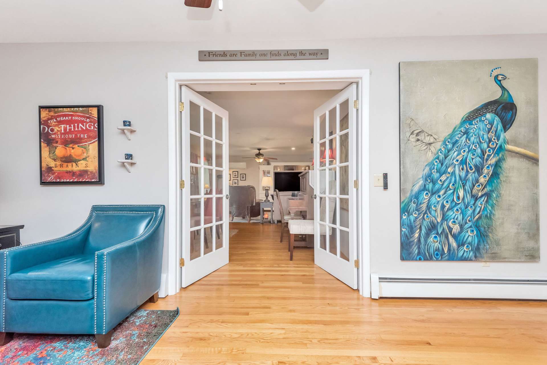 French doors lead to the formal dining area, the large living area and the covered porch.