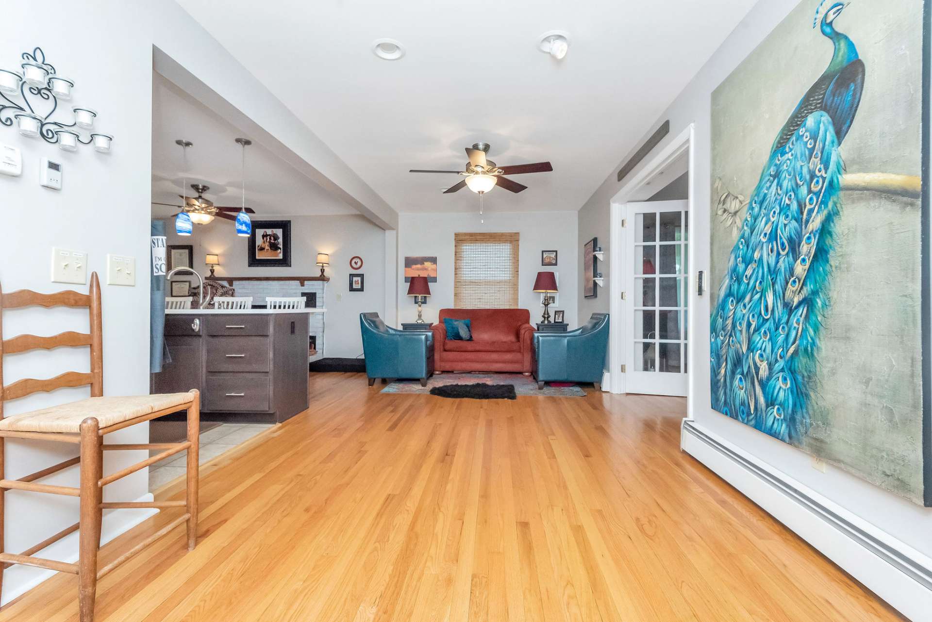 The foyer opens to a spacious den and kitchen area