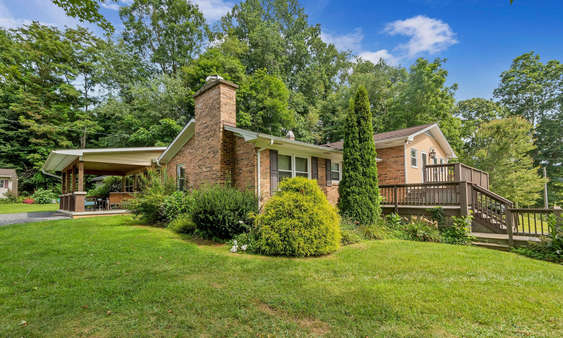 Spacious renovated home on a gracious 1.127-acre lot with easy access and mountain views