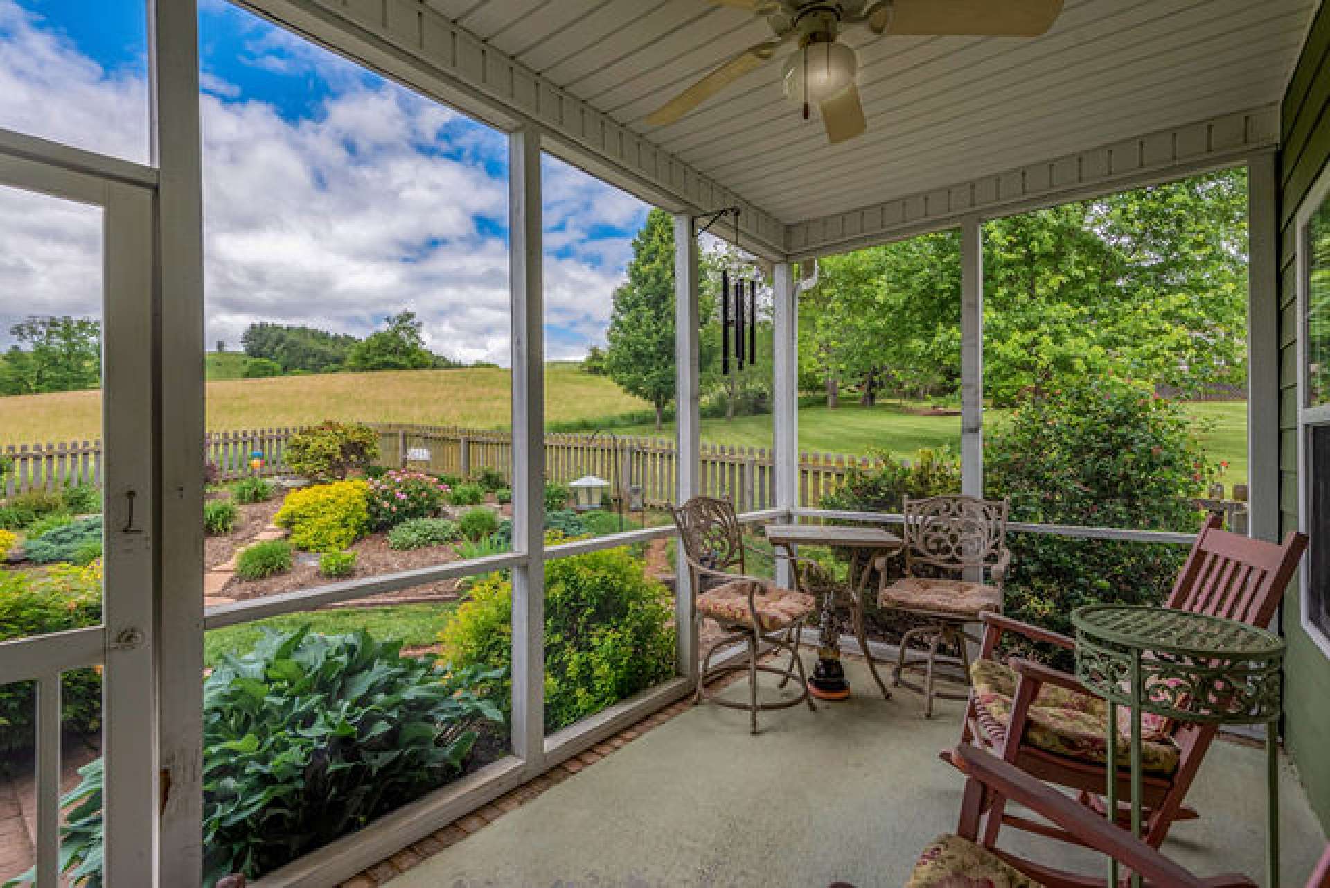 Screened in private back porch off the Kitchen